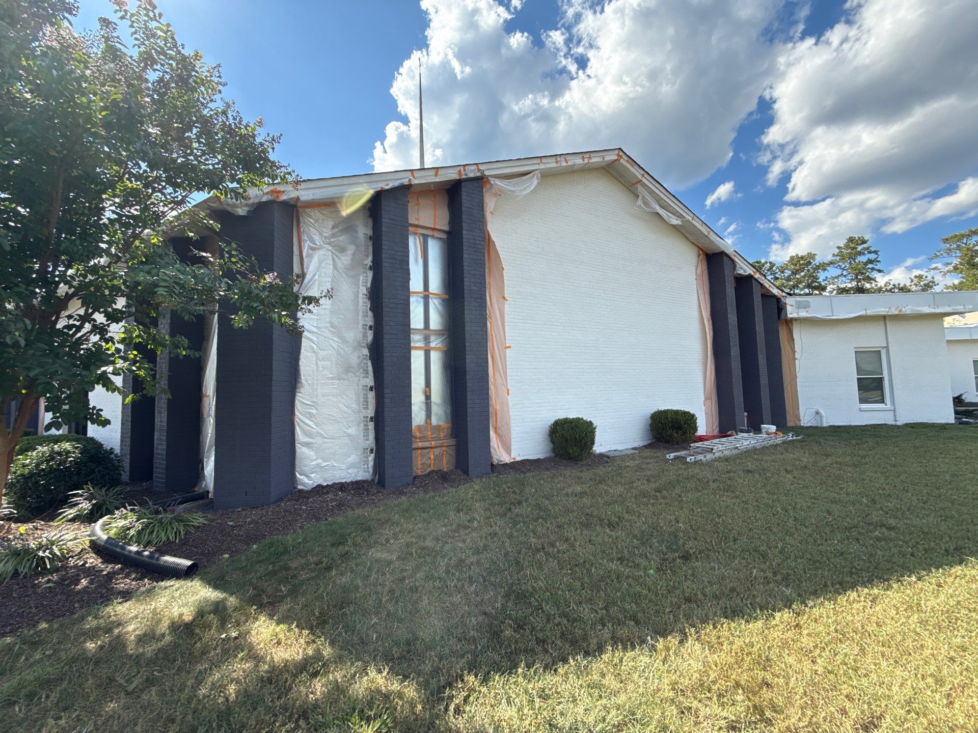 Church Exterior Brick Painting with Romabio Masonry Flat by Highfill Painting