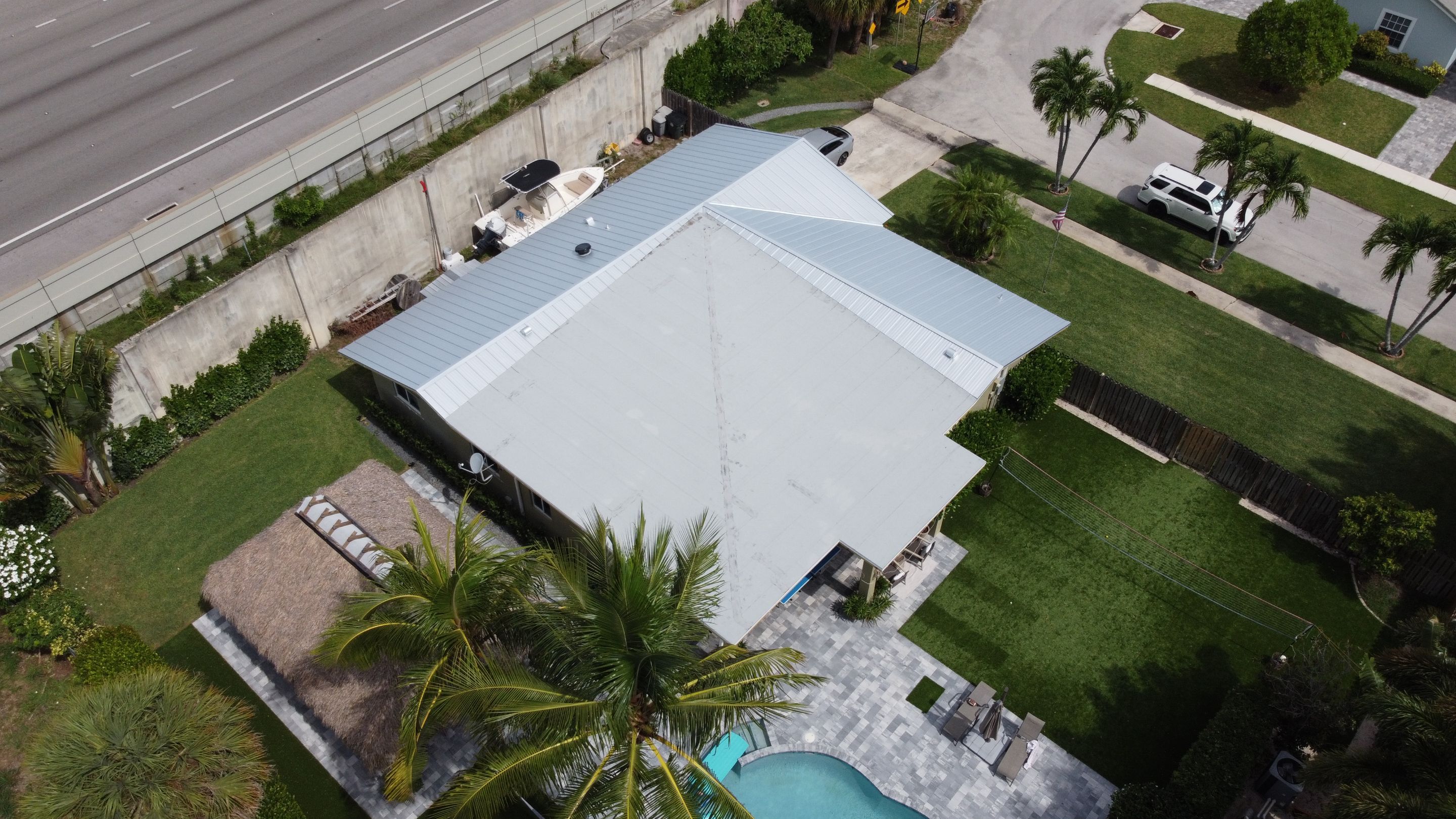Residential Roofing Installation using 1" Nail strip metal roof by BLUES BROTHERS CONSTRUCTION CORP