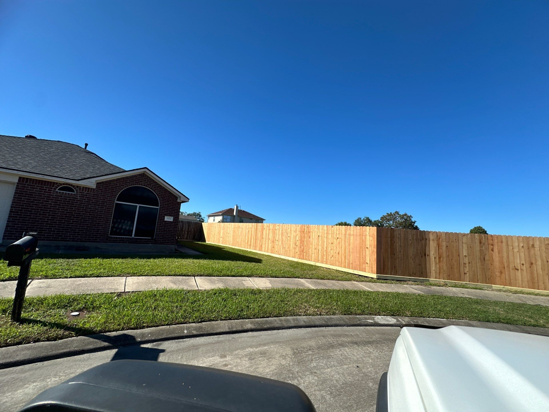 Premium Commercial Fence Installation with Western Red Cedar Pickets, 3 Rails, and Deluxe Wood Gates" by Tim's Fences