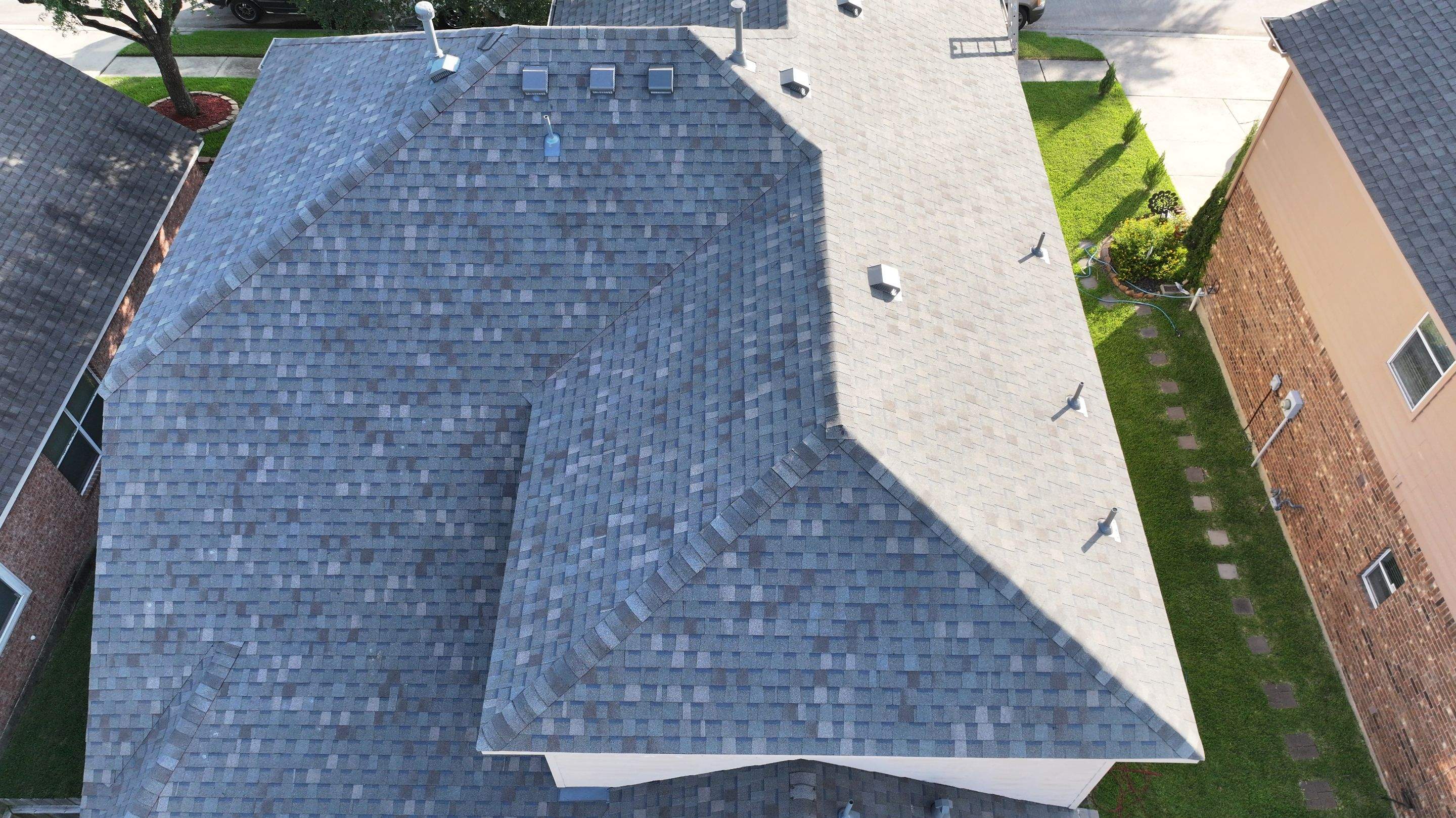 Storm-Damaged Roof Replaced — Houston, TX by PL Roofing & SB Roofing, LLC.