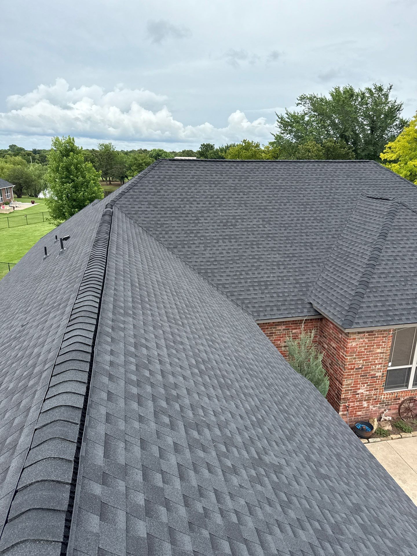 roof replacement & gutter installation in Blanchard by McCann's Roofing and Construction