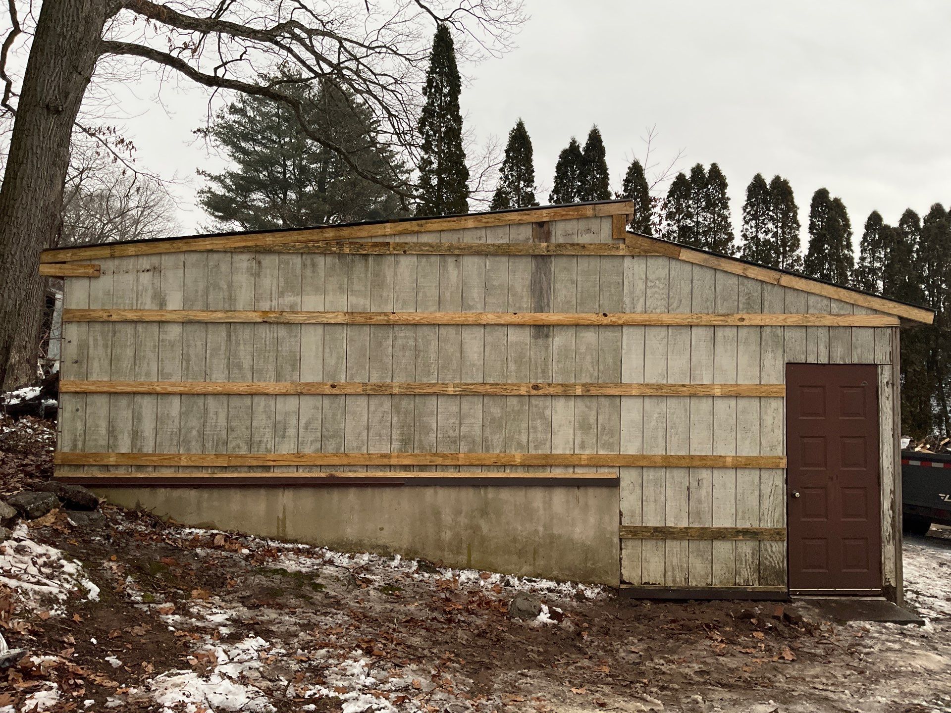 New Red Metal Garage Construction and Residential Window Replacement in Ashland by Esh Builders