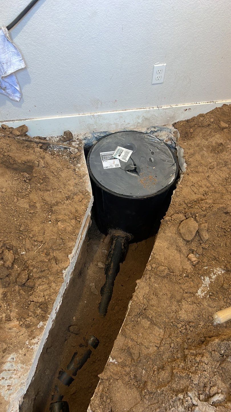 Basement Sump pump/pit by Plumbing Connect Systems LLC