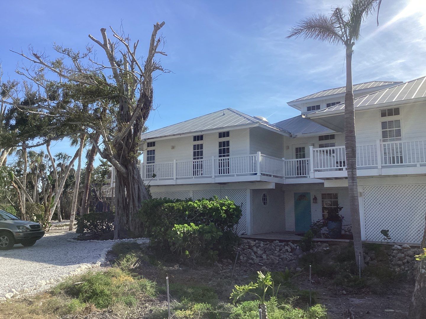 White Gutter Installation in Sanibel FL by Gutter Professors