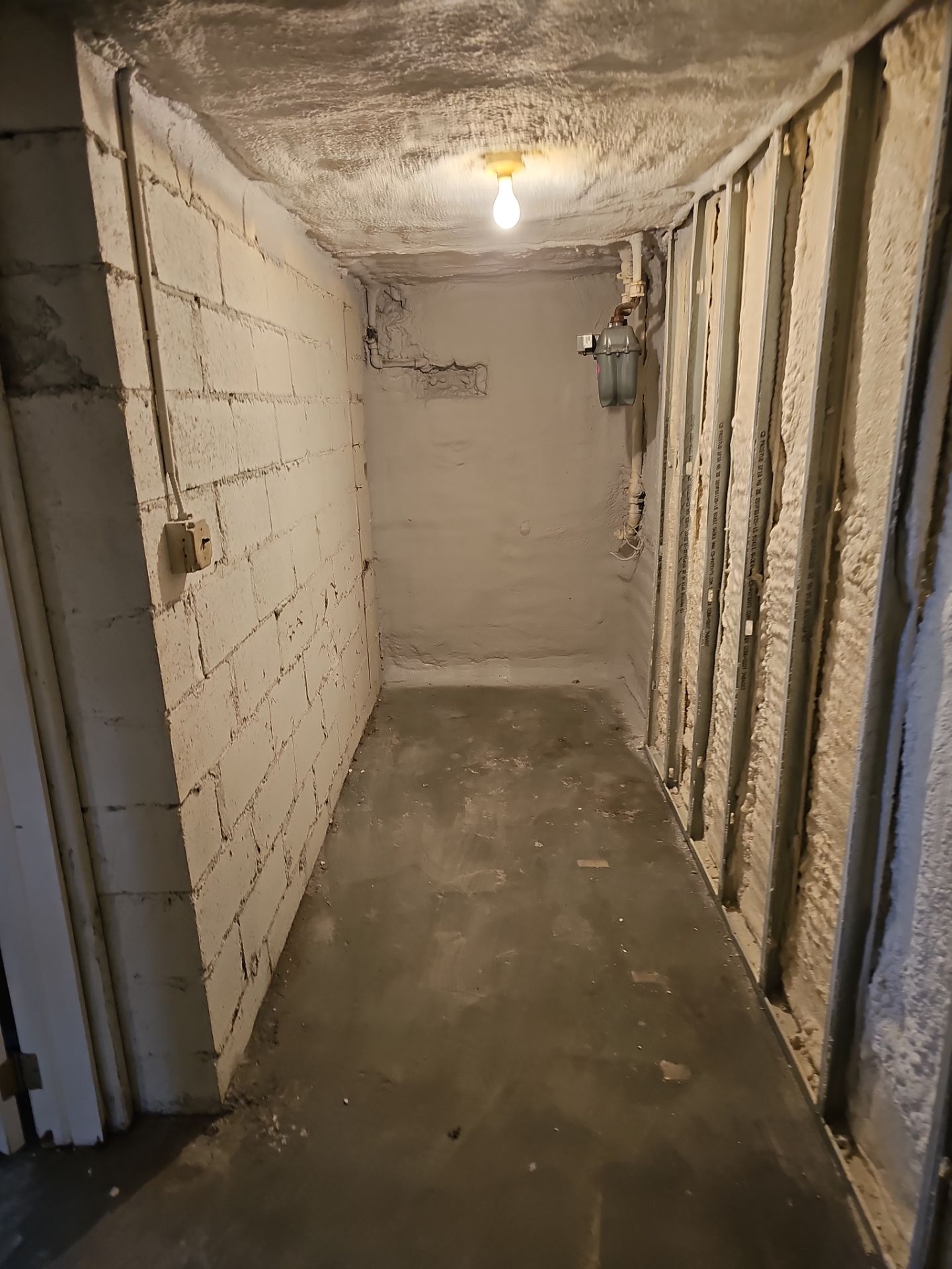 Basement Exterior Walls using Closed Cell Spray Foam by NYS Foam & Energy