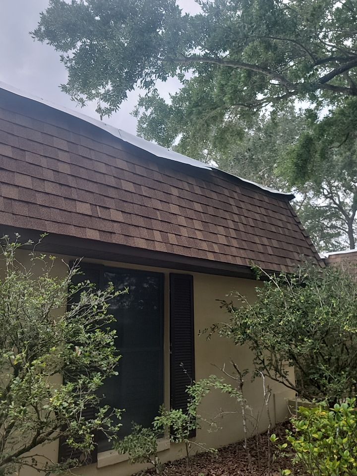 Winter Park Residential Re-Roof and Flat Roof Membrane Installation by Tip Top Roofing Co., Inc.