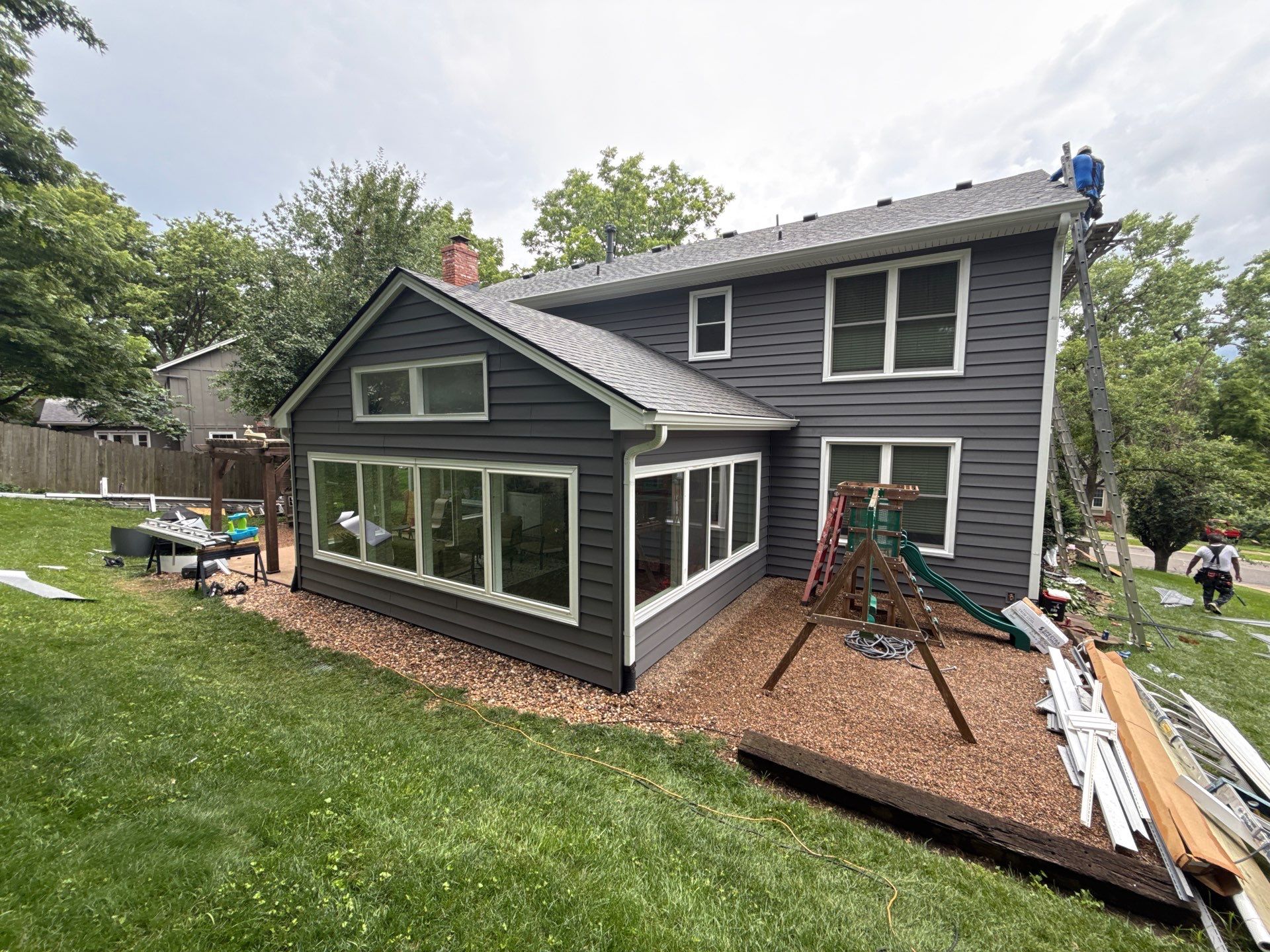Full Exterior Siding Upgrade and Board and Batten Installation in Shawnee by EEC Windows, Siding & Roofing