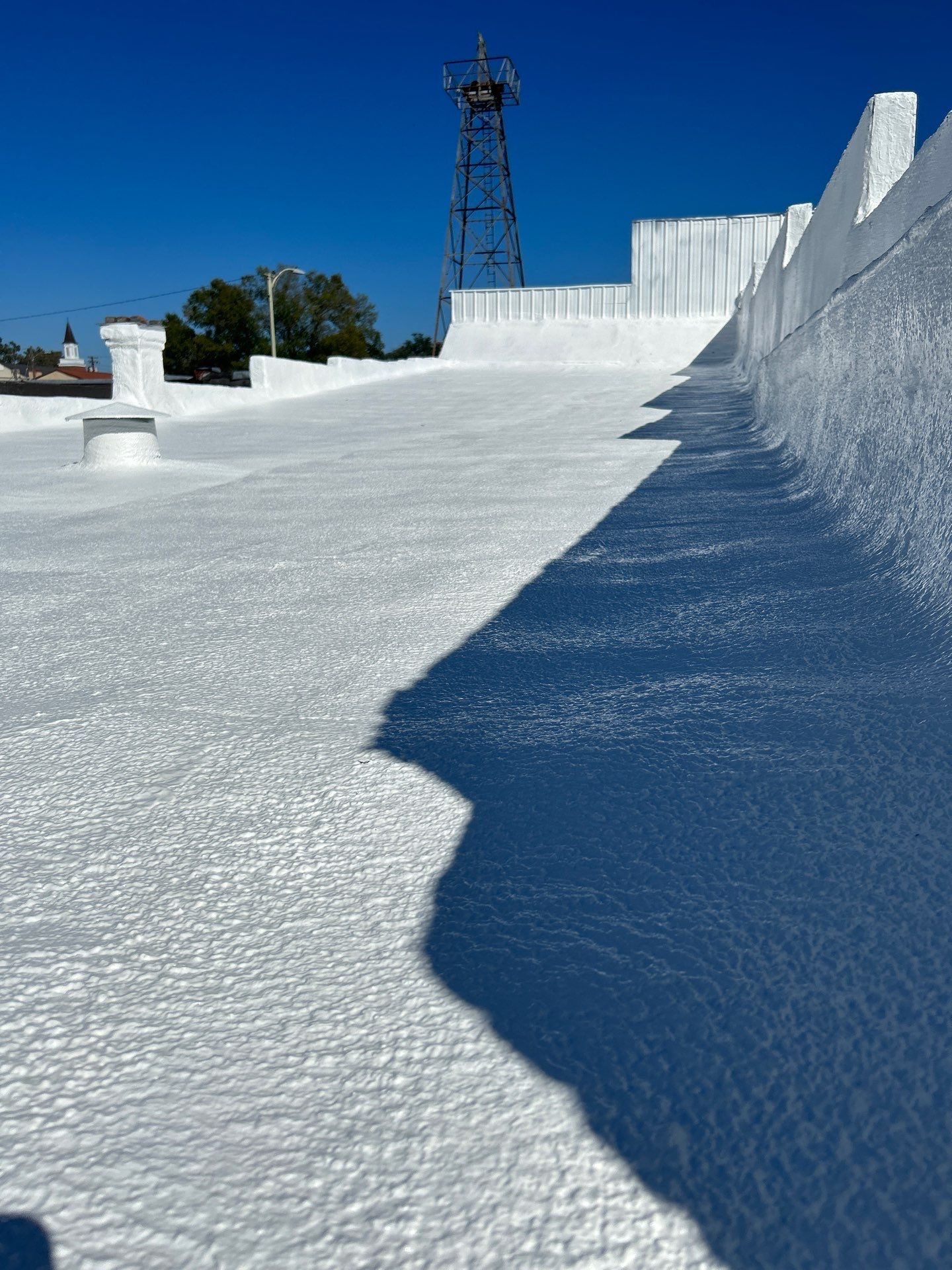 Downtown Gladewater Commercial Foam Roof Restoration – SPF + High-Tensile Acrylic by All Star Roofing LLC