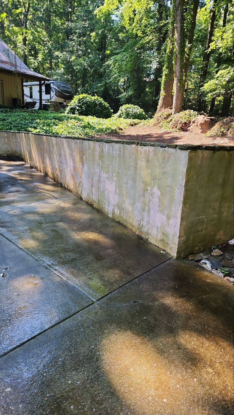 Driveway Clean using cleaner by Power Wash Masters LLC