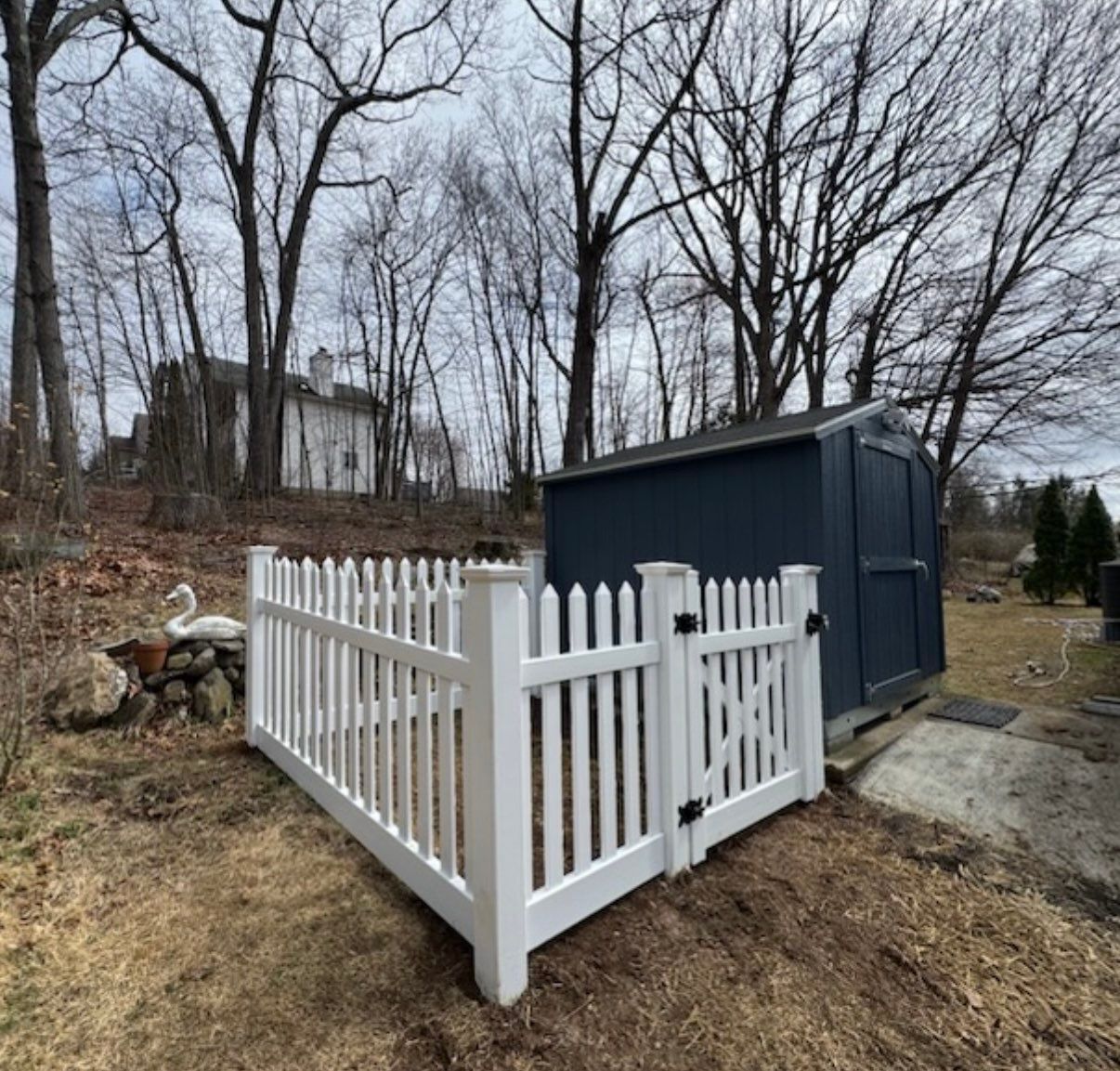 New White Vinyl picket fence with matching gate by DiGiorgi Roofing and Siding Inc
