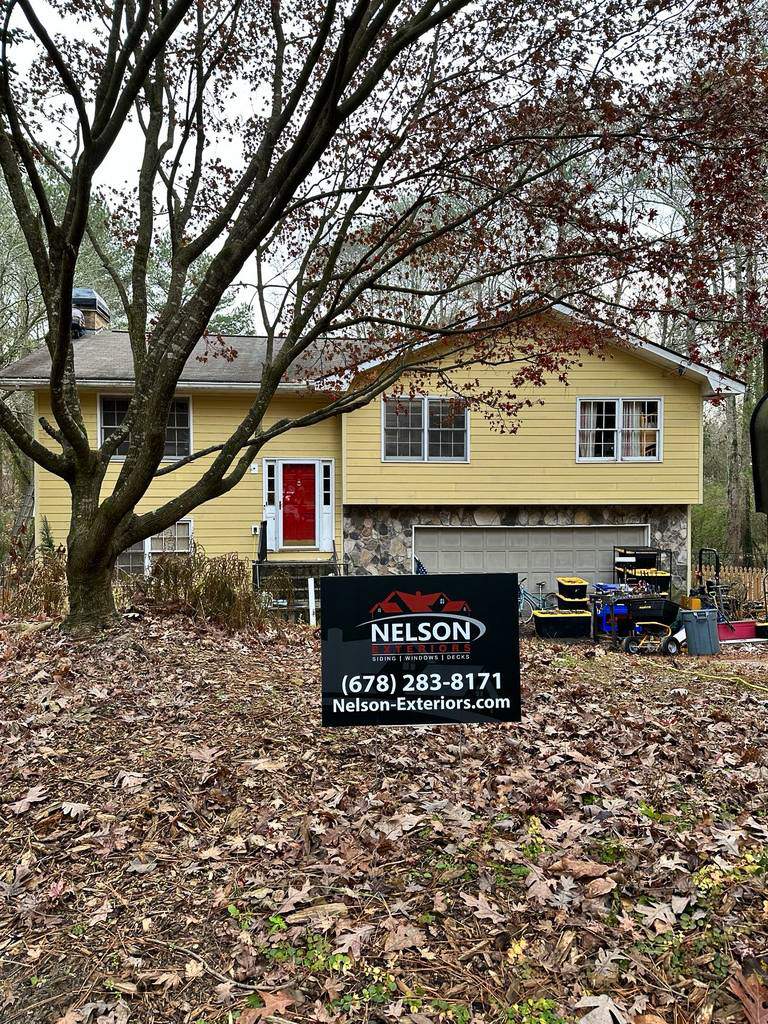 Atlanta, GA James Hardie Siding, Pressure Treated Wood Deck Replacement, and Exterior Painting by Nelson Exteriors 