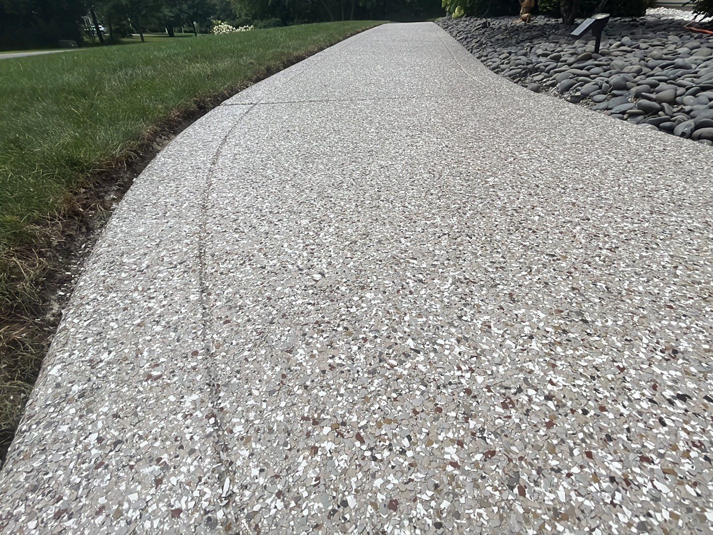 Scarelli Garage & Walkway TransFLOORmation by Symphony Concrete Coatings