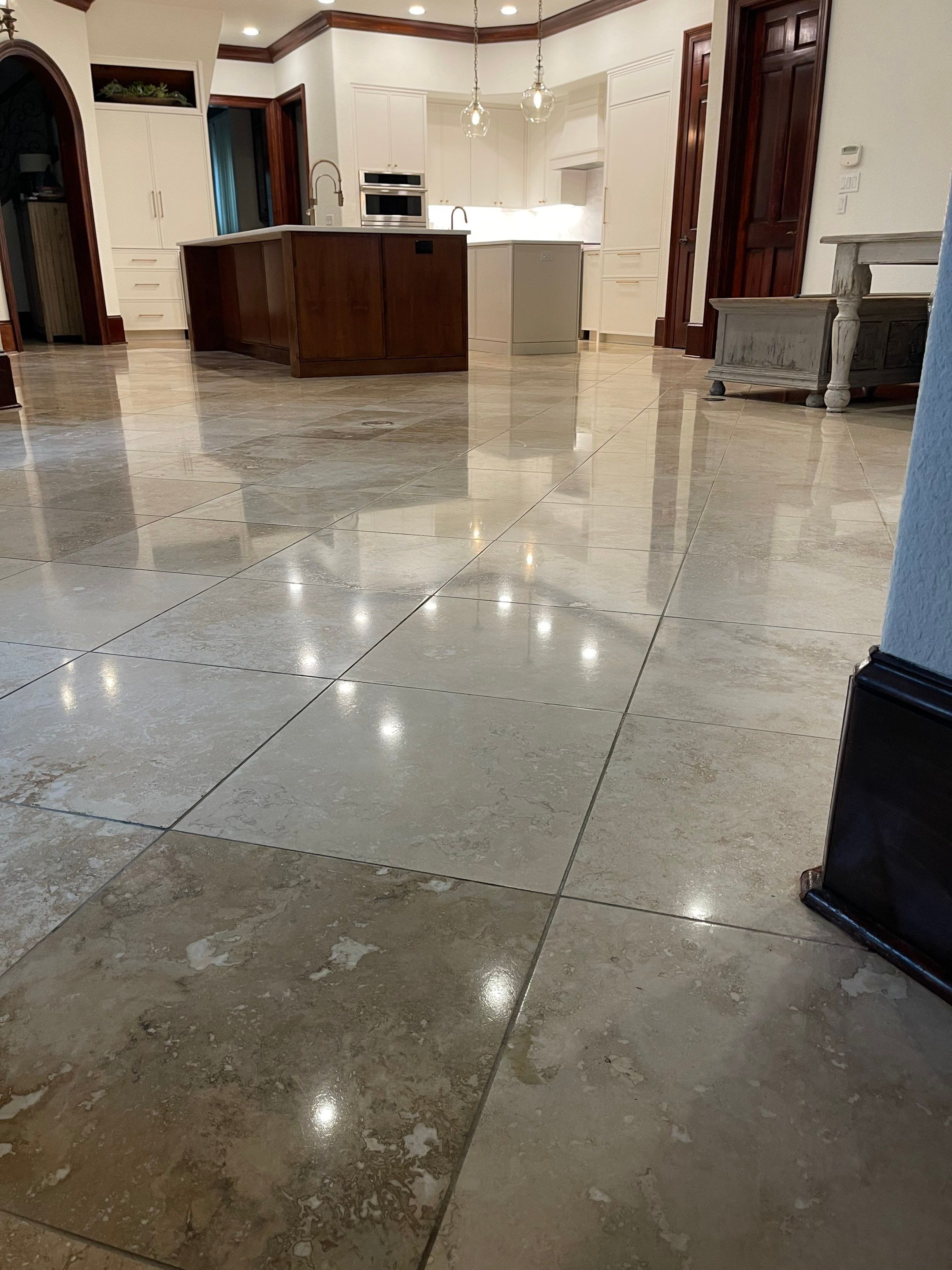 Polished Travertine Floor Restoration for Gulf Shores Residence by Cornerstone Hard Surface Restoration