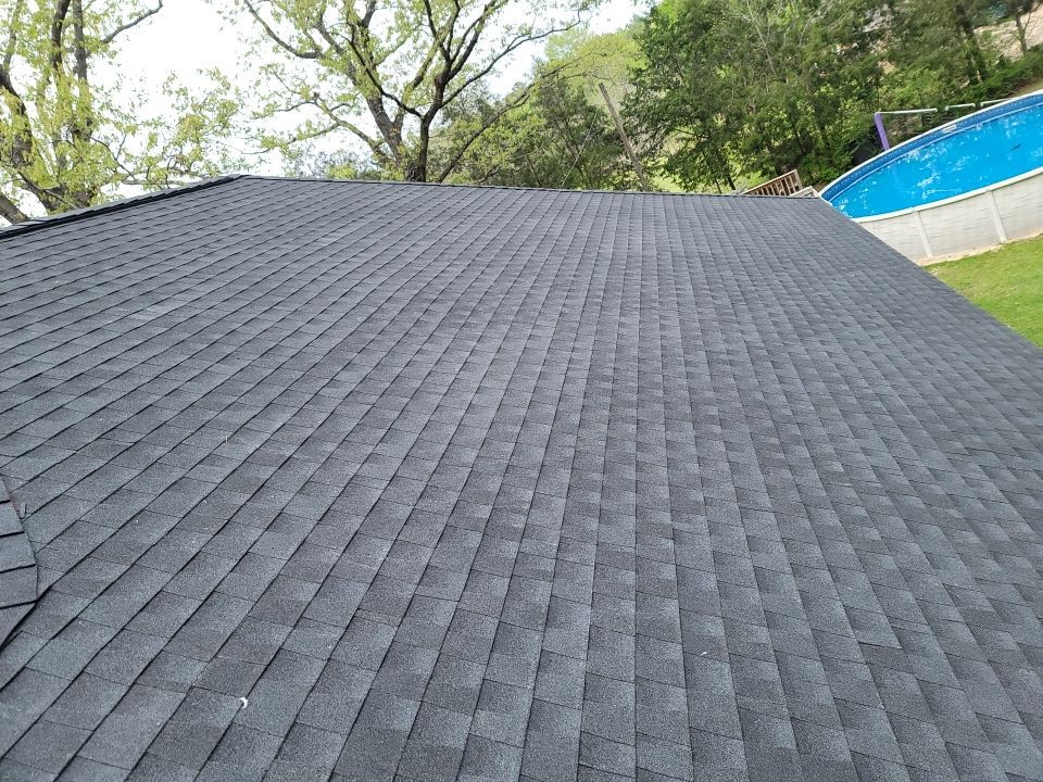 Residential Roofing Installation using Roof Replacement by American Roofing & Construction LLC
