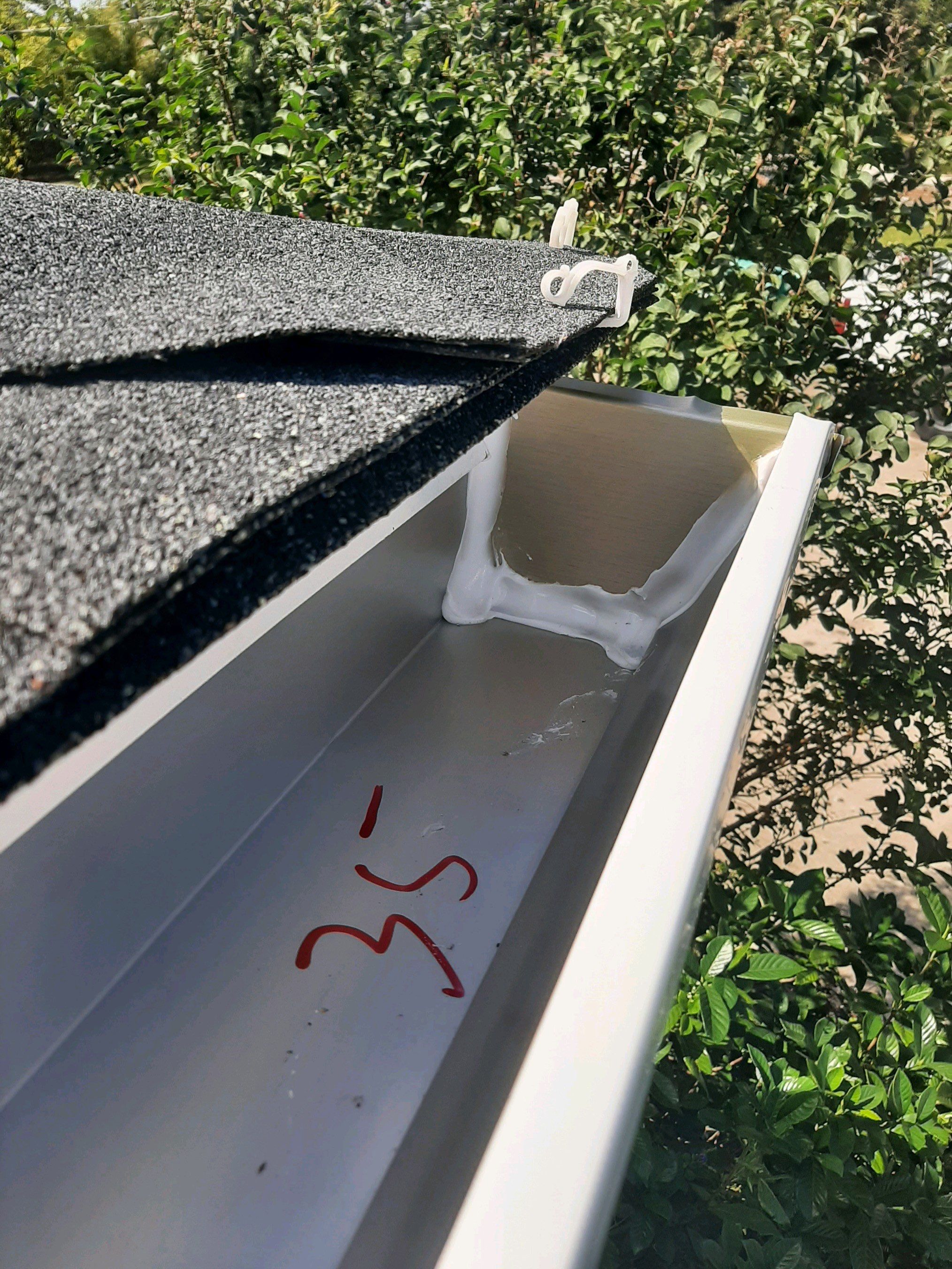 Seamless Gutter Installation using White K-Style Gutters by Gutter Professors