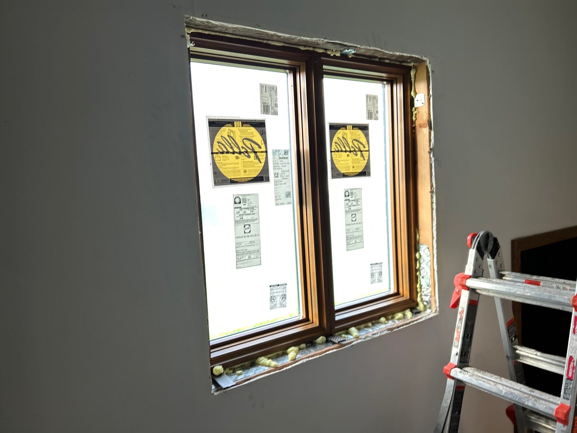 Window replacement using Pella Lifestyle wood/Aluminum window by United Windows and Siding LLC