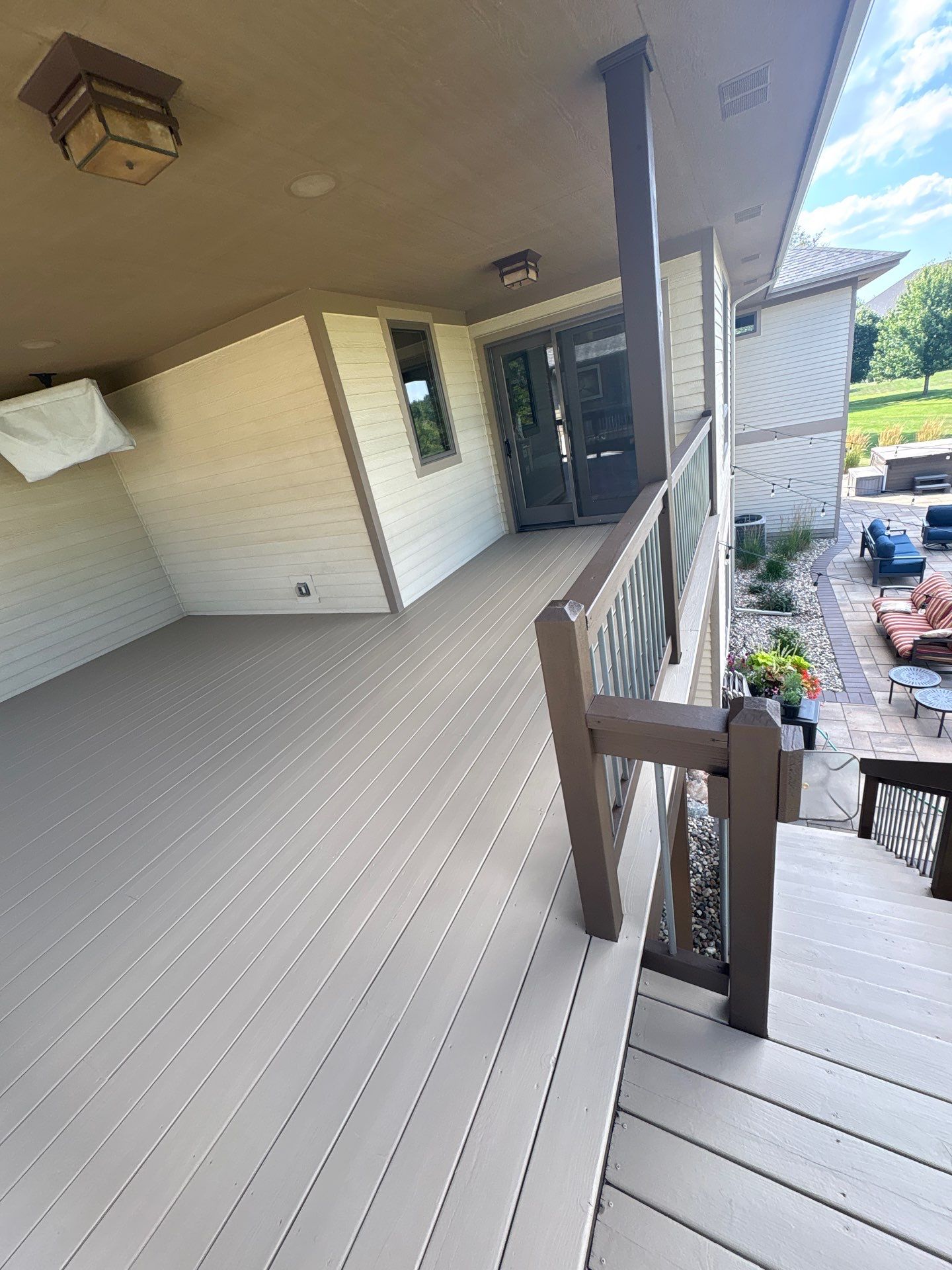 Sioux Falls Exterior Refresh and Multi-Level Deck Maintenance by Select Painting, Coatings & Garage Cabinets