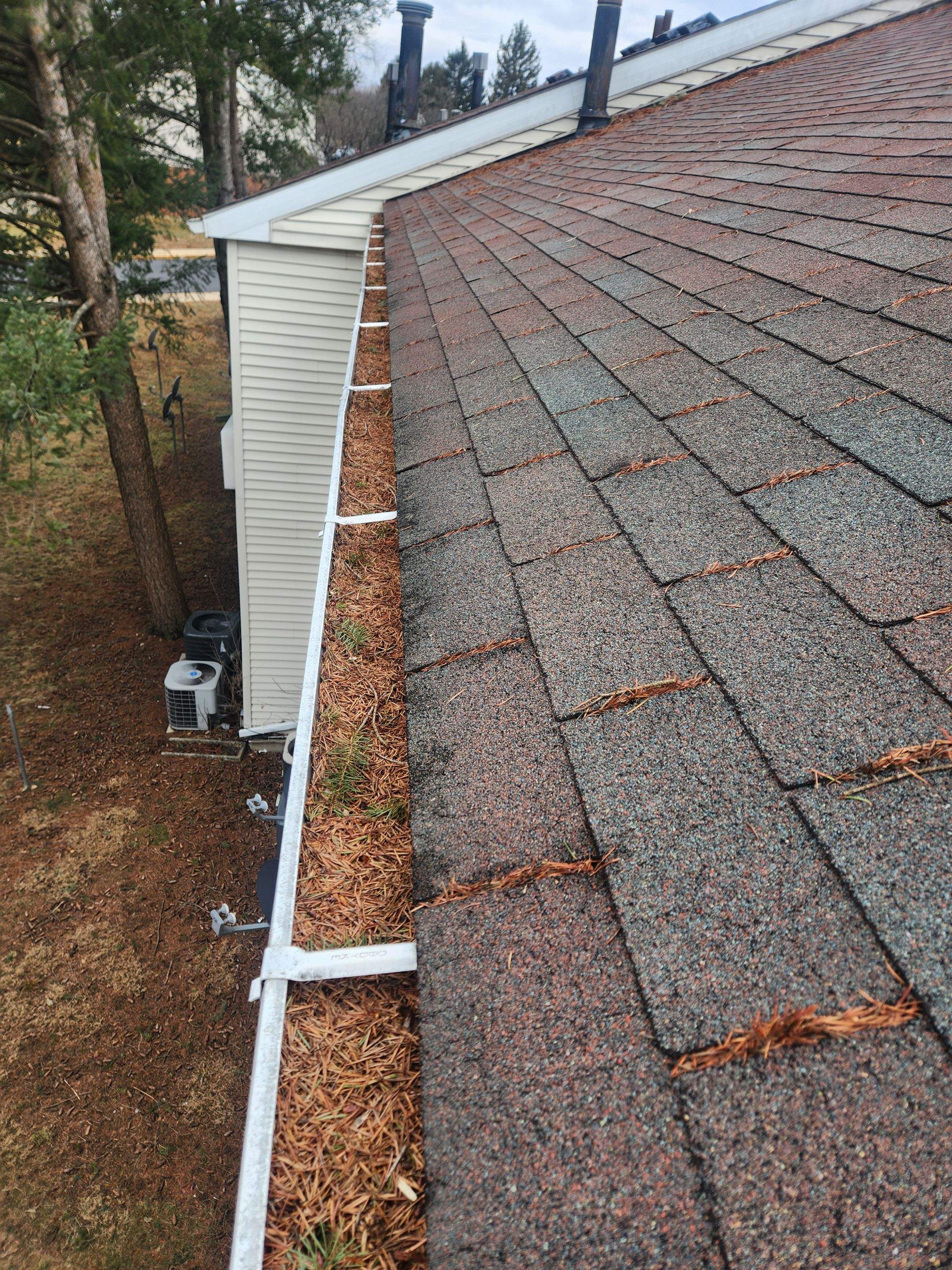 Commercial gutter cleaning Reading, PA before photo with filled gutters