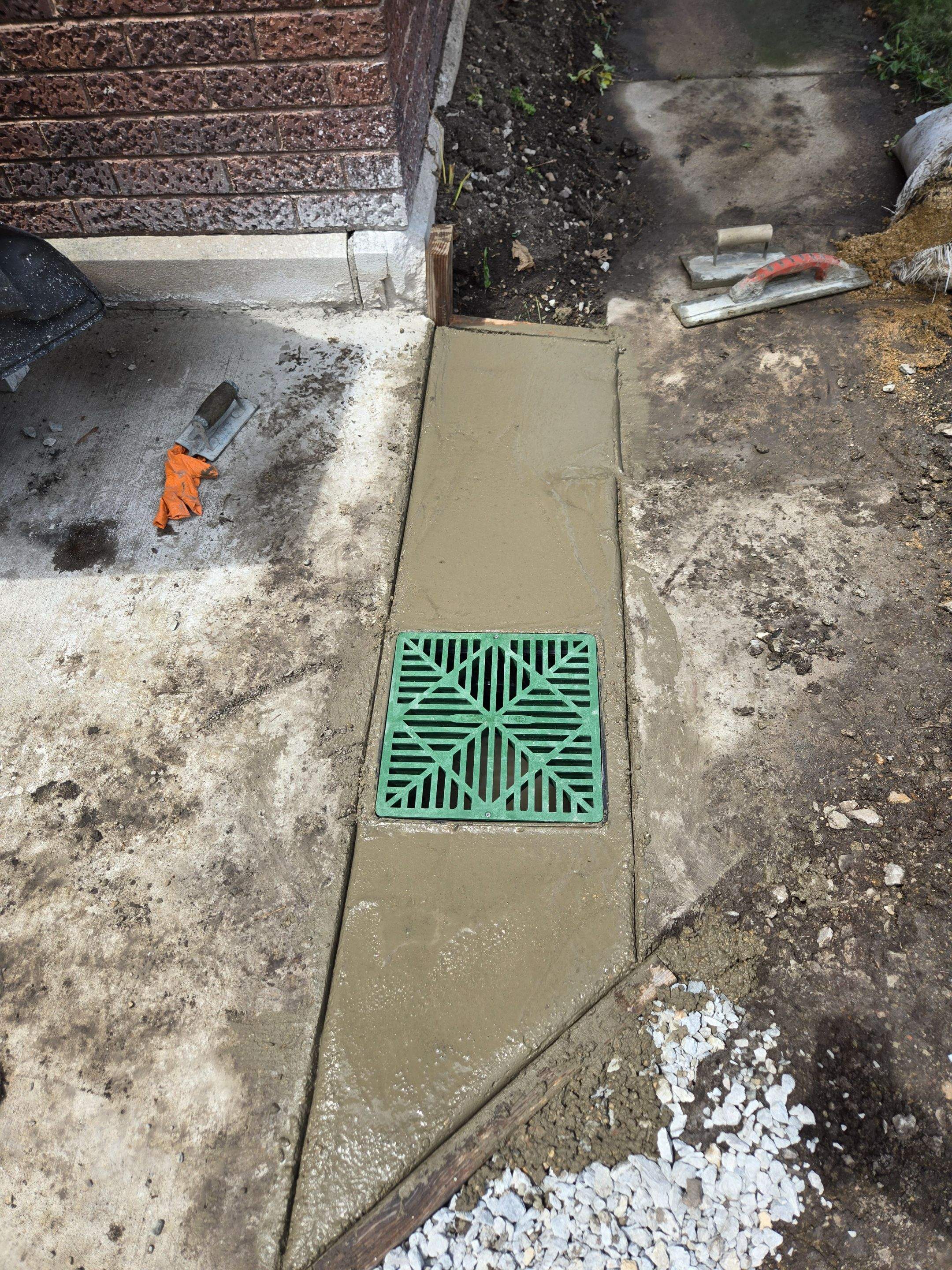 Enhanced Exterior Water Capture Basin With Ultimate Water Drainage French Drain System by Allied Water Services