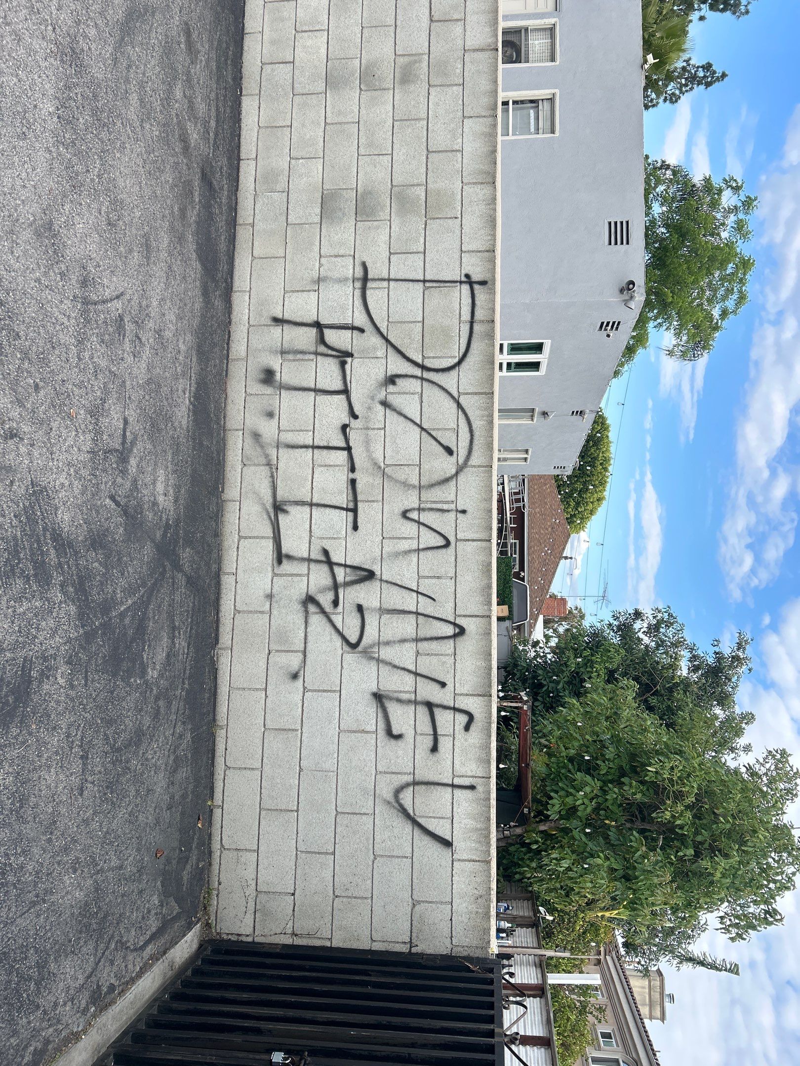 Sandblasting Graffiti Off Brick Wall In Downey, CA by La Power Washing Inc 