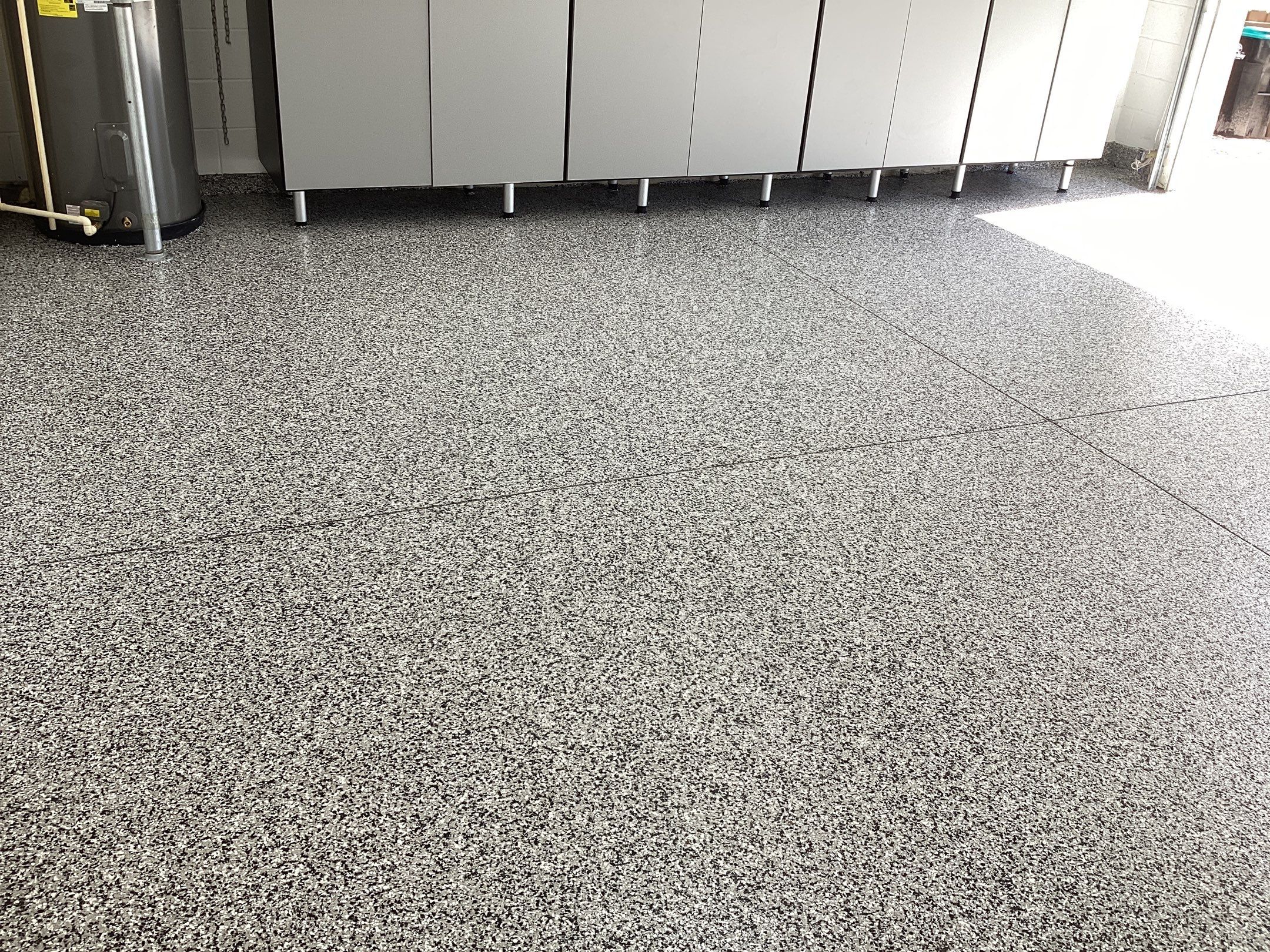 Garage using Domino by Amvet concrete coatings llc