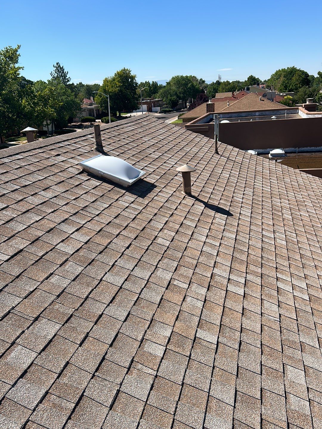 Brownwood Shingles by Reimagine Roofing