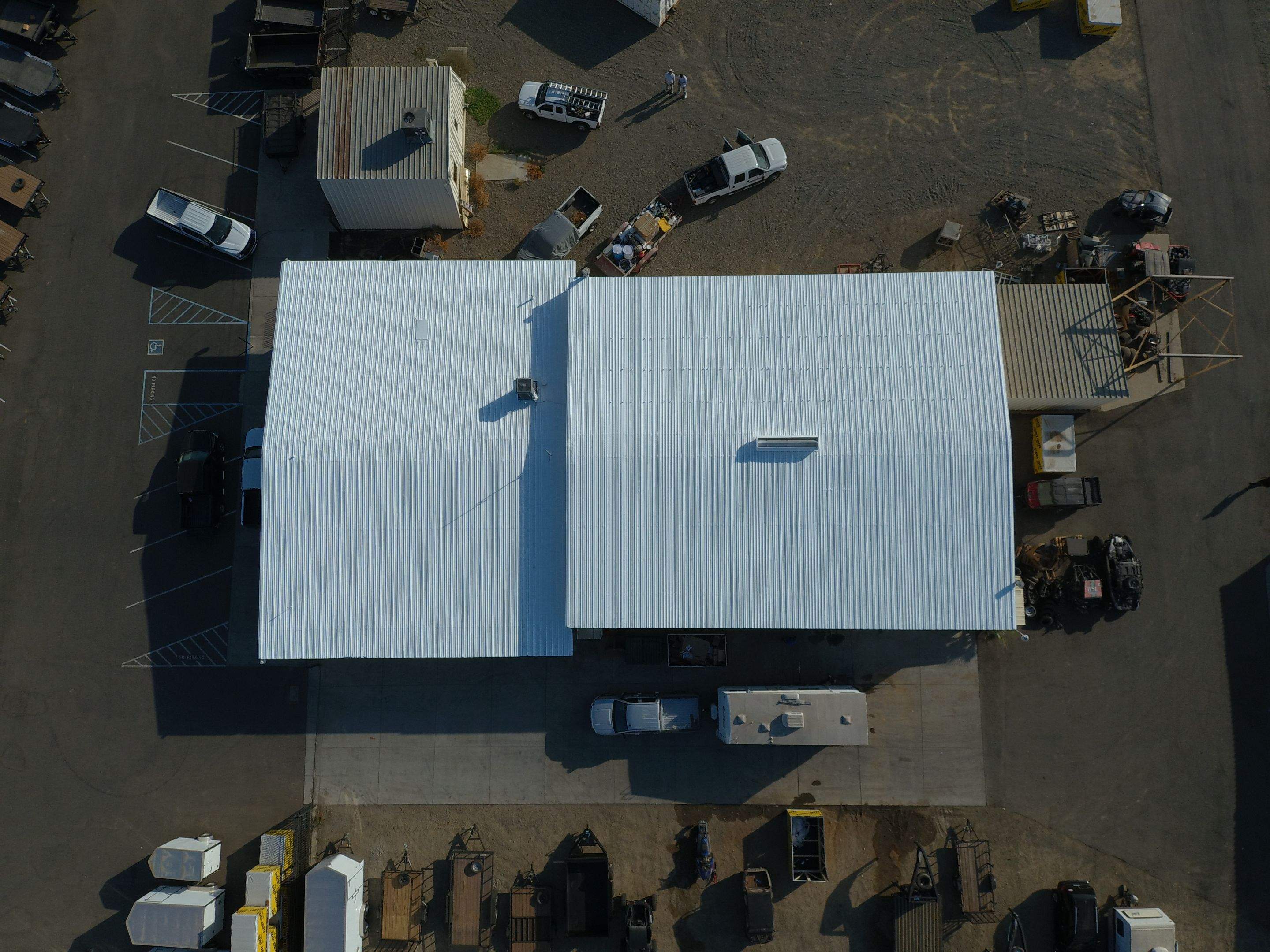 Metal Restoration Roofing system with Benchmark/PUMA XL 20 yr warranty by Straight Edge Roofing Inc