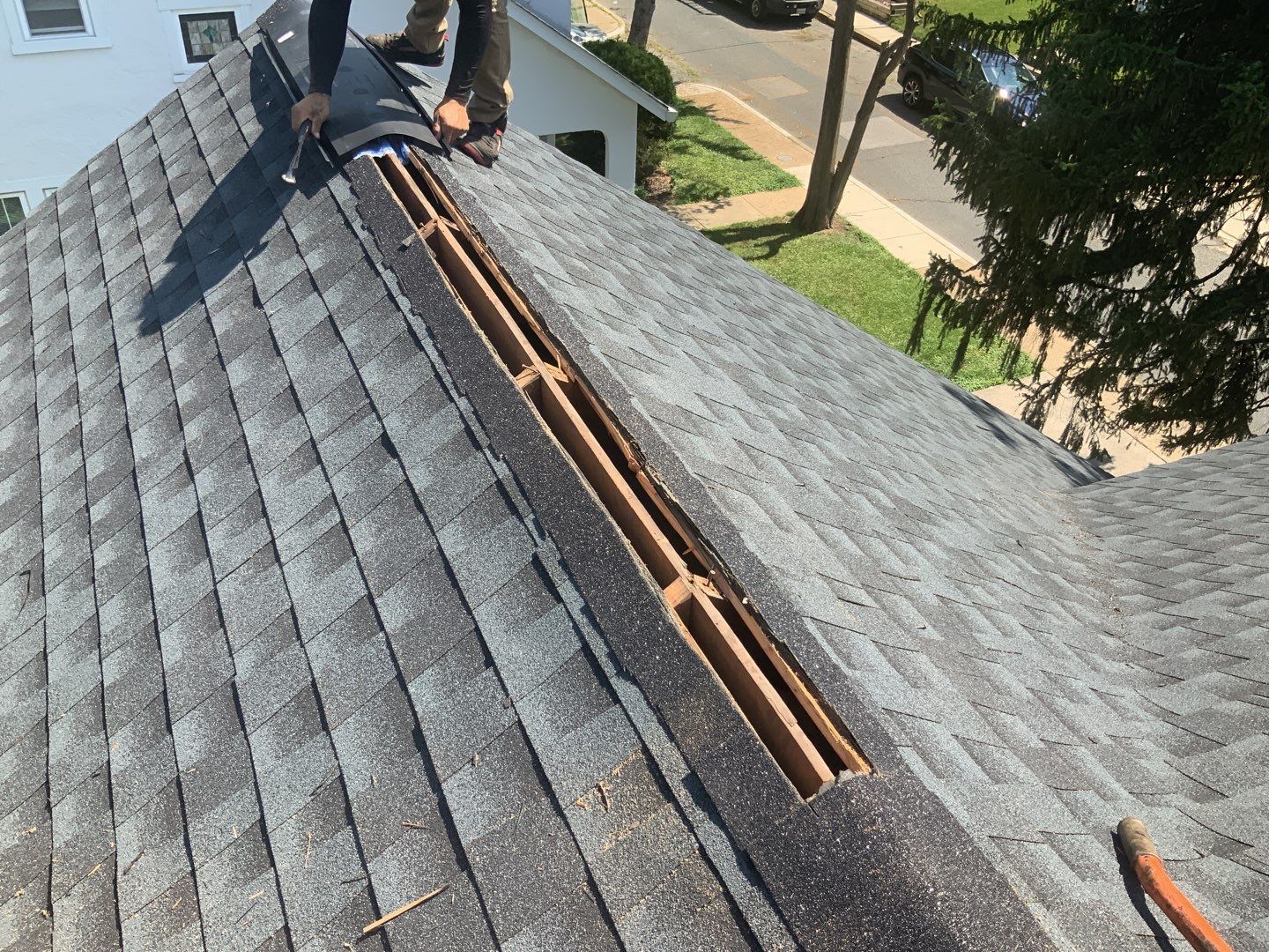 Residential Roofing Repair using Ridge Vent  by Alpha Design Services