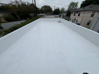 Commercial Silicone Roof System using American Standard Coatings Silicone-S