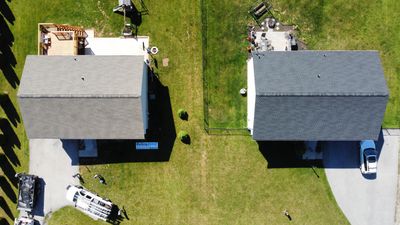 New BulletpROOF+ Lifetime Roofing System due to wind damage.