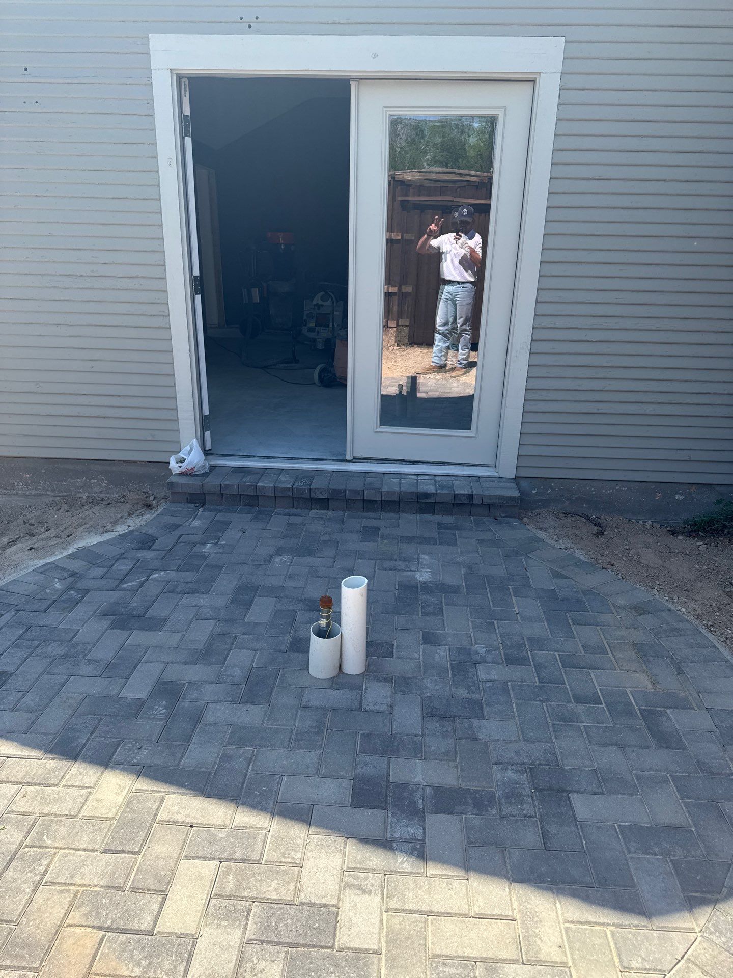 Modern Plunge Pool with Dark Interior and Paver Patio by Pinnacle Pools and Spas - DFW