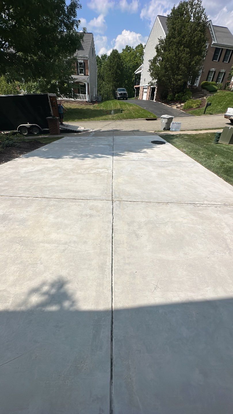 Pool Deck + Driveway + Garage Project in Venetia by Floors in a Day, Inc