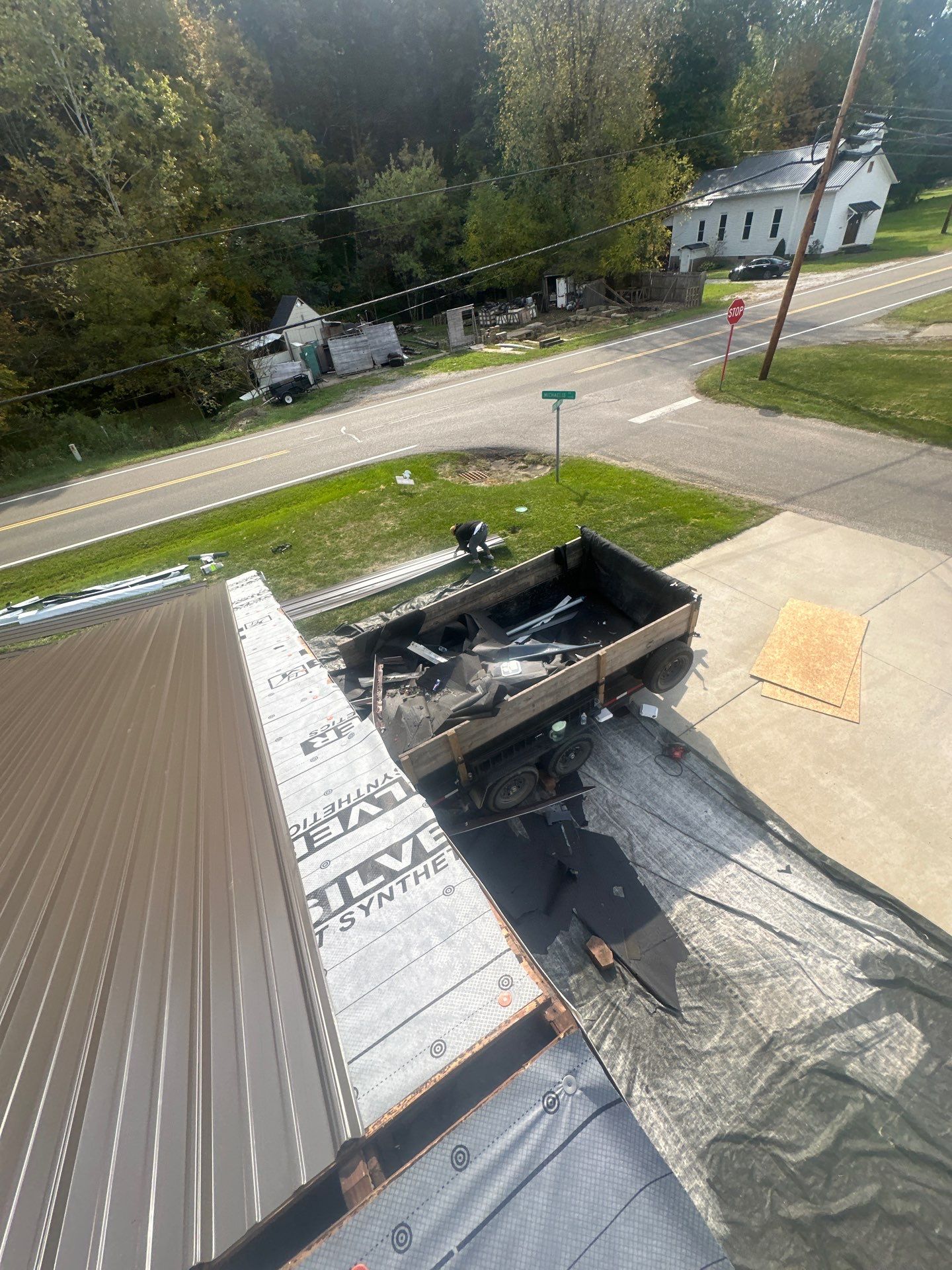 Residential Roofing Installation using Metal by Rainstoppers Roofing