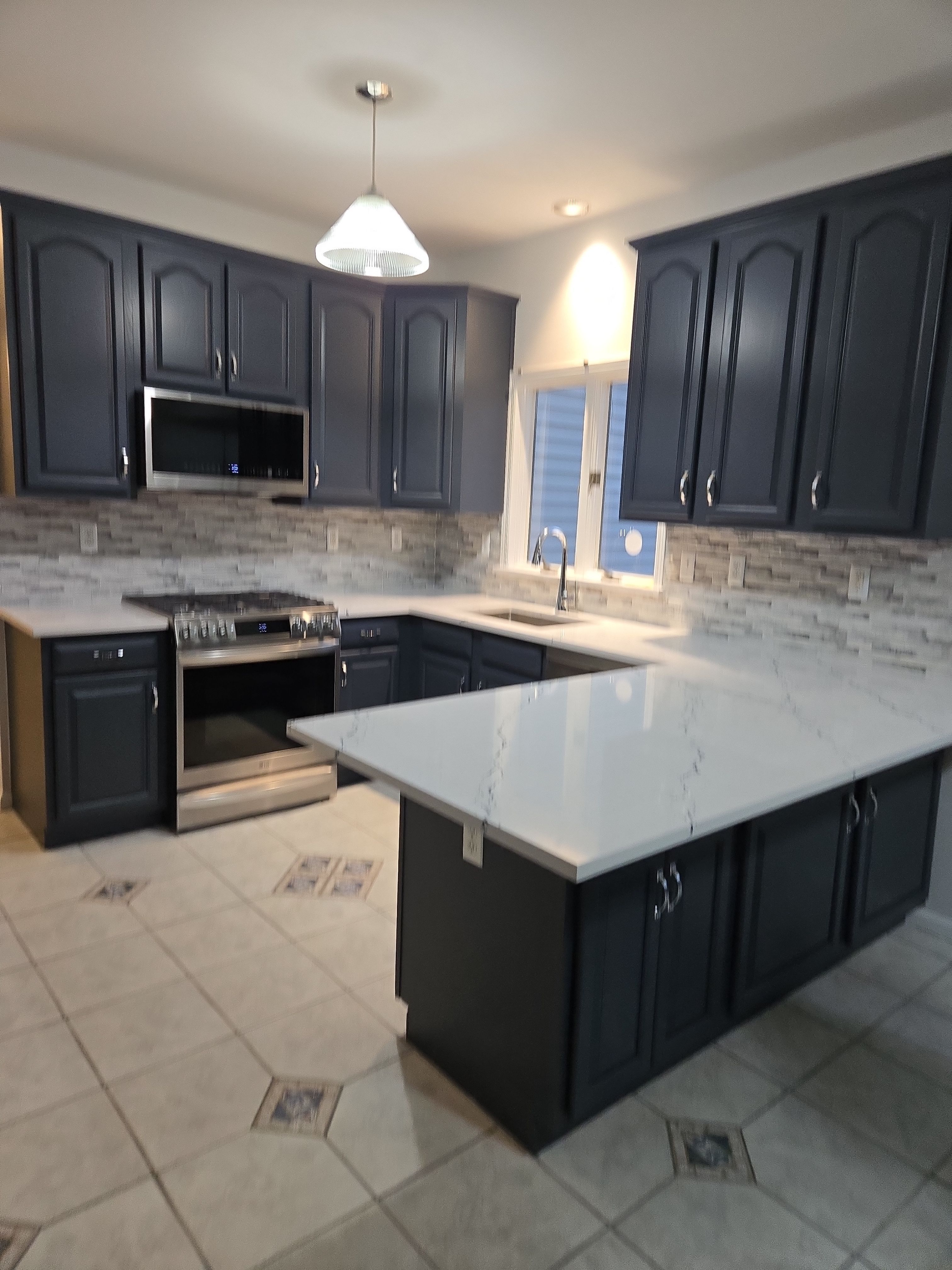 Cabinet Refinishing using Benjamin Moore Command by Spectrum Painting, LLC
