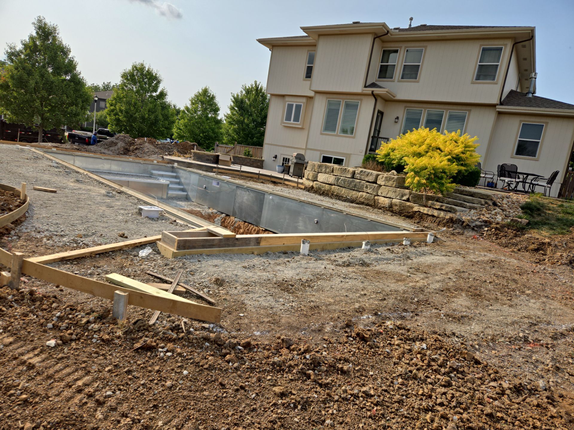 Back Yard Pool Patio by LAND ESCAPES LLC