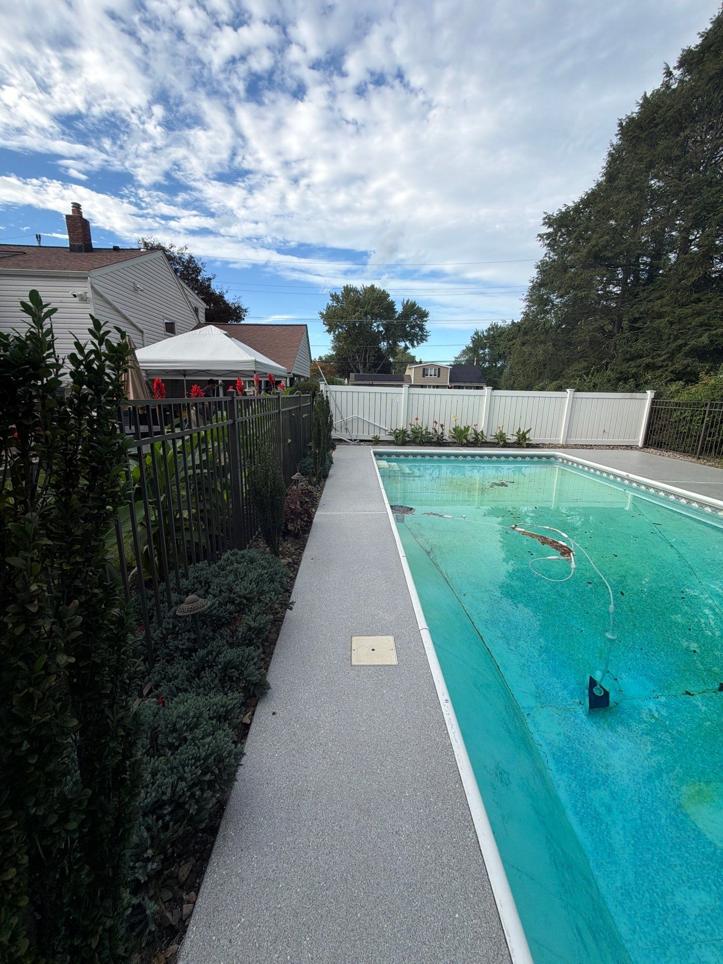 Blue Granite Pool Patio Concrete Coating in Lincoln Park by Spectrum Painting, LLC