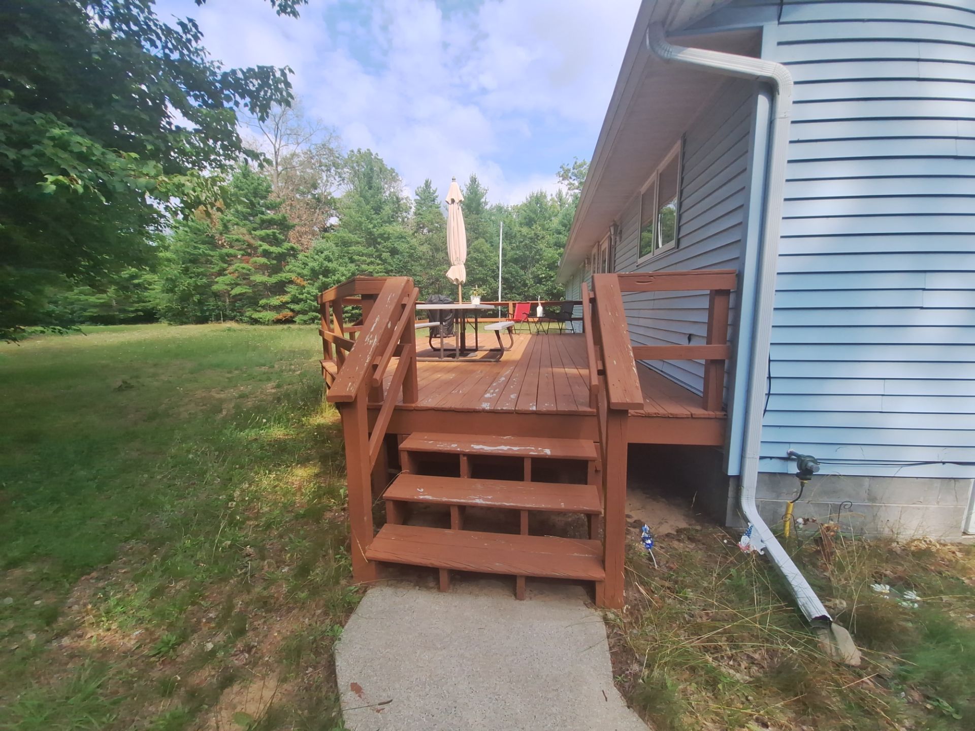 Deck staining and exterior foundation painting! by Gordon Painting