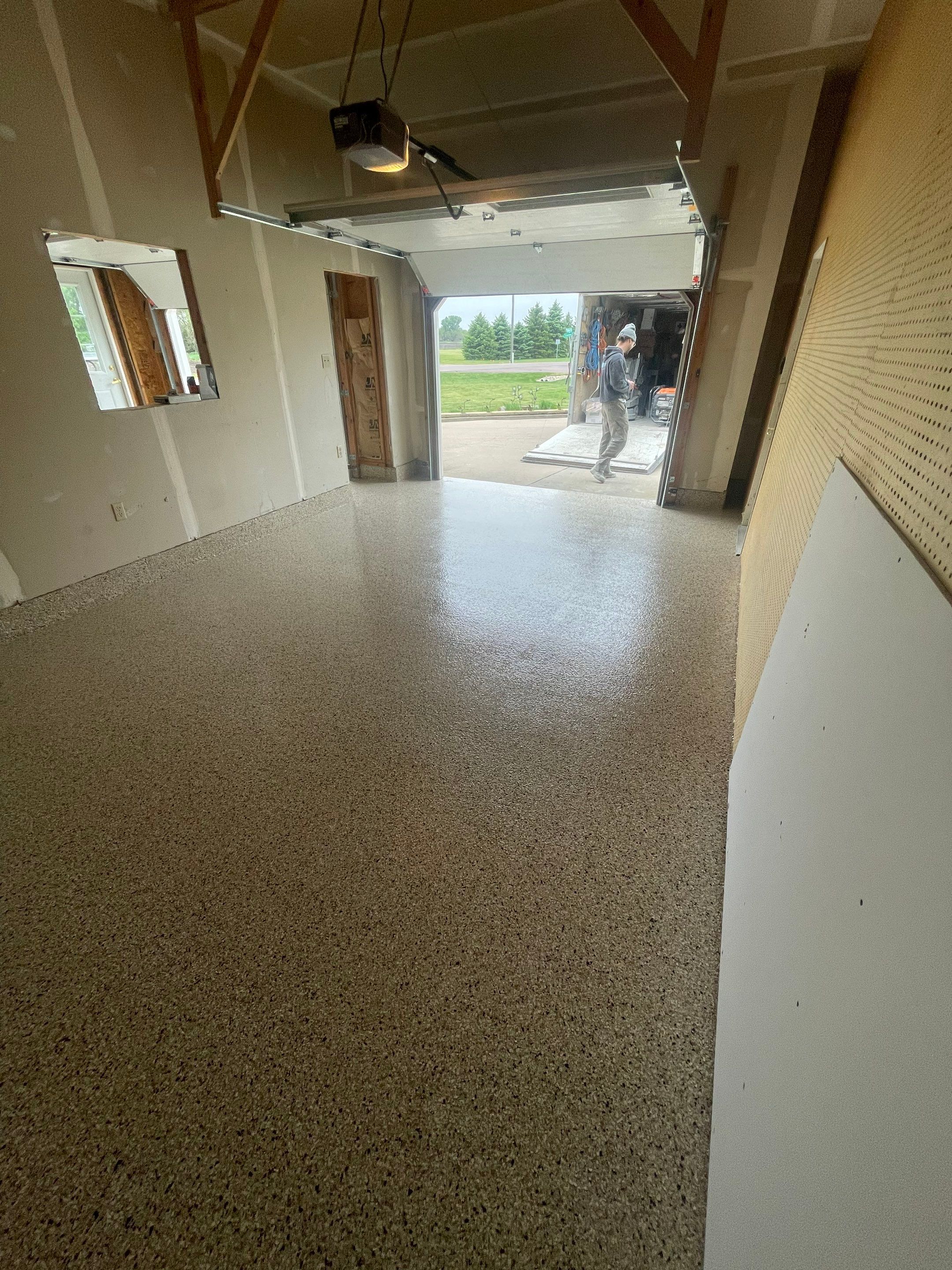 Speckled Epoxy Floor Coating Installation for Centerville Residential Garage by Select Painting, Coatings & Garage Cabinets