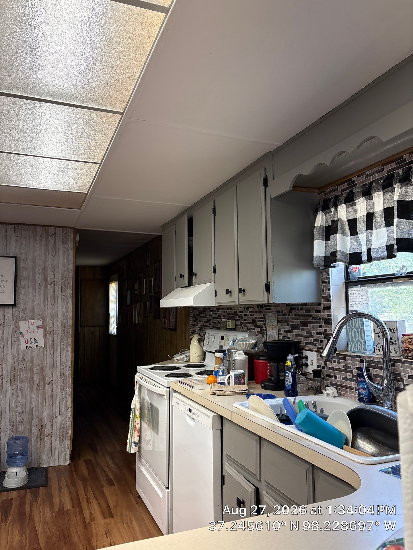 Attica Kitchen Remodel With Grey Cabinets and Mosaic Backsplash by CompanyCam Sales Demo