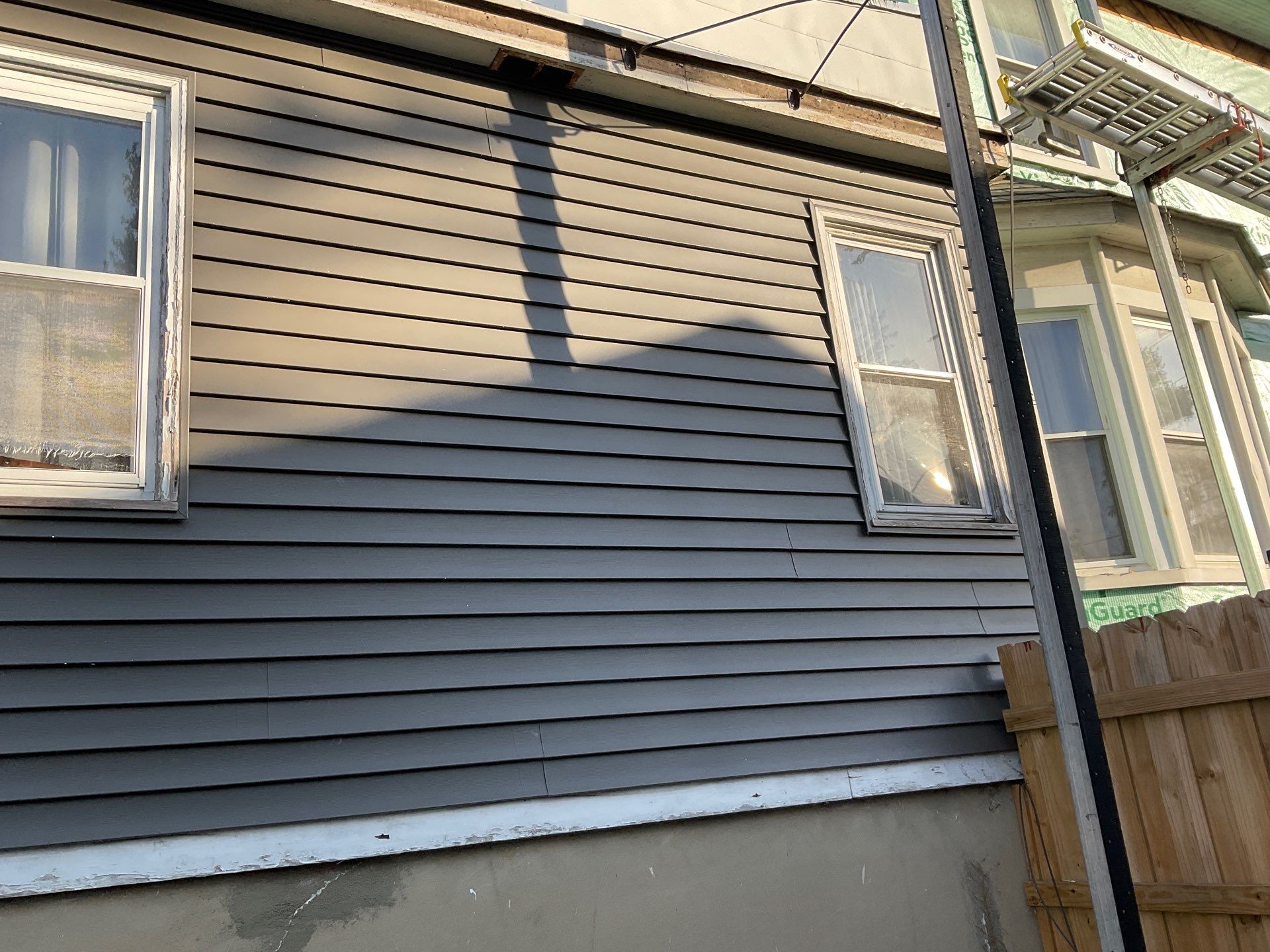 New siding & New Gutters by Alpha Design Services