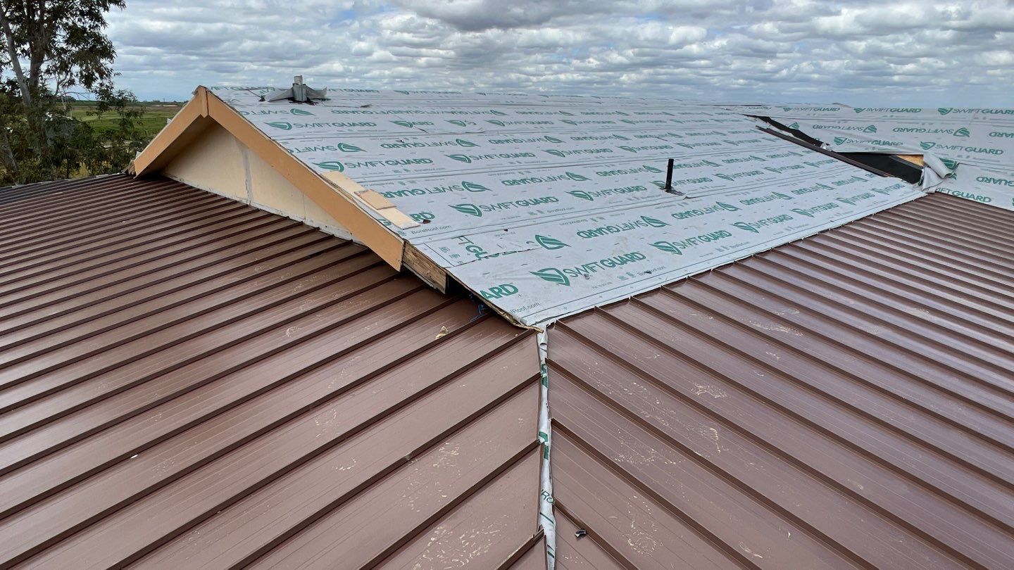 Metal roofing installation using Standing seam metal roofing system by Straight Edge Roofing Inc