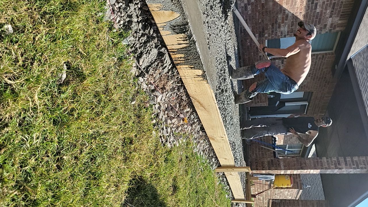Concrete slab with Pergola by Clays Services Inc