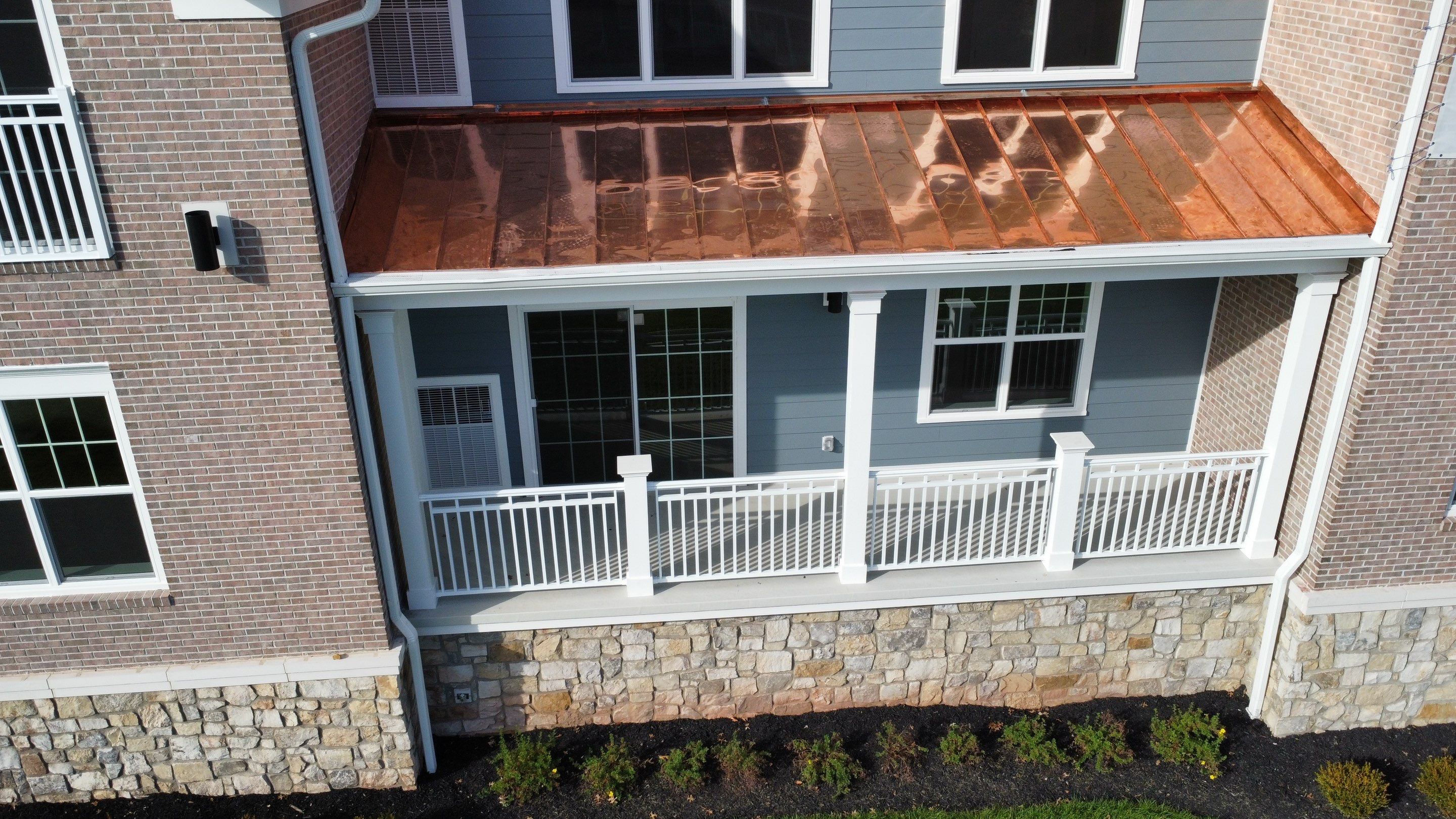Standing Seam Metal Roof using Copper by CMNG LLC