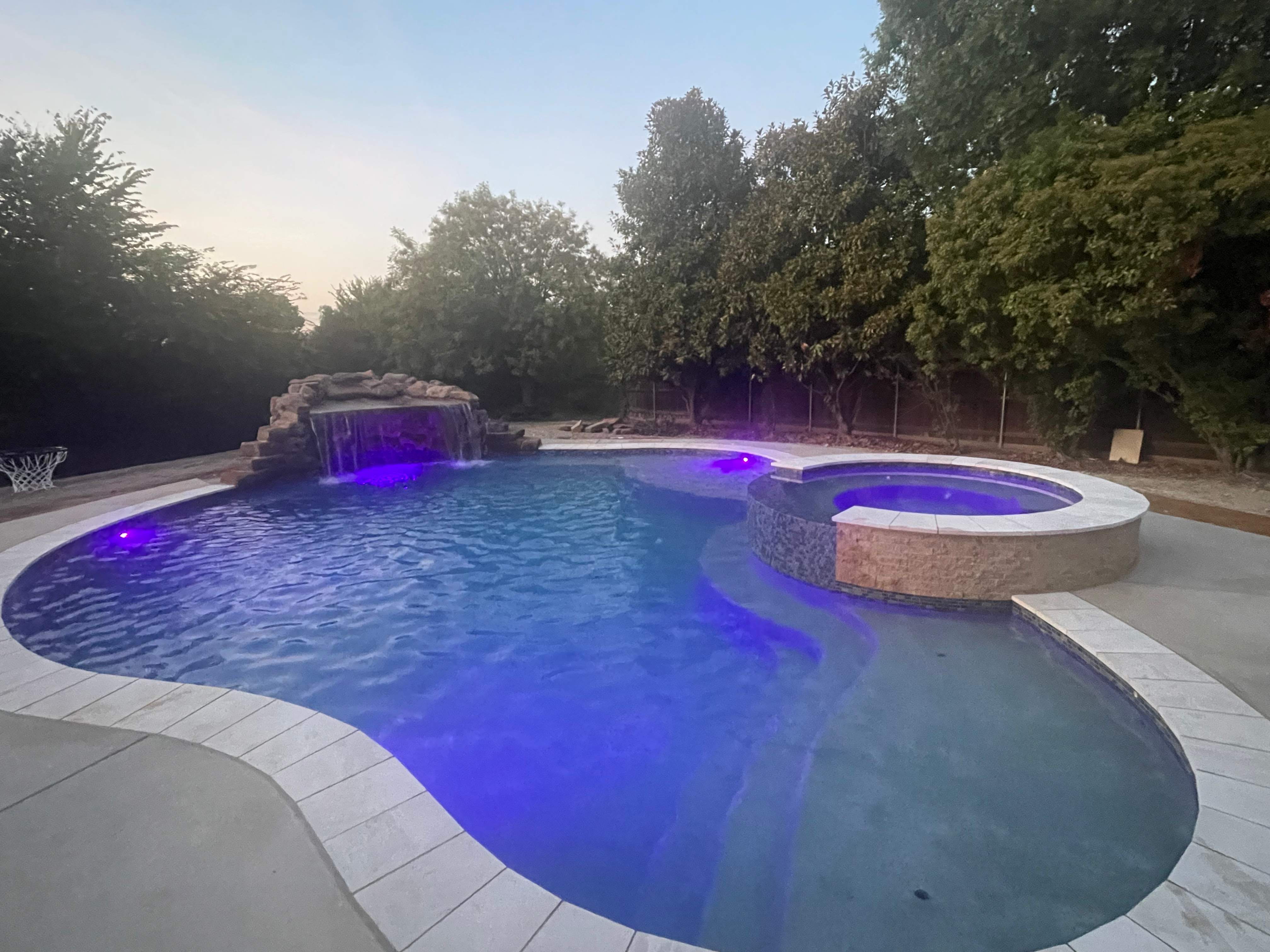 Large Freeform Resort-Style Pool by Pinnacle Pools and Spas - DFW