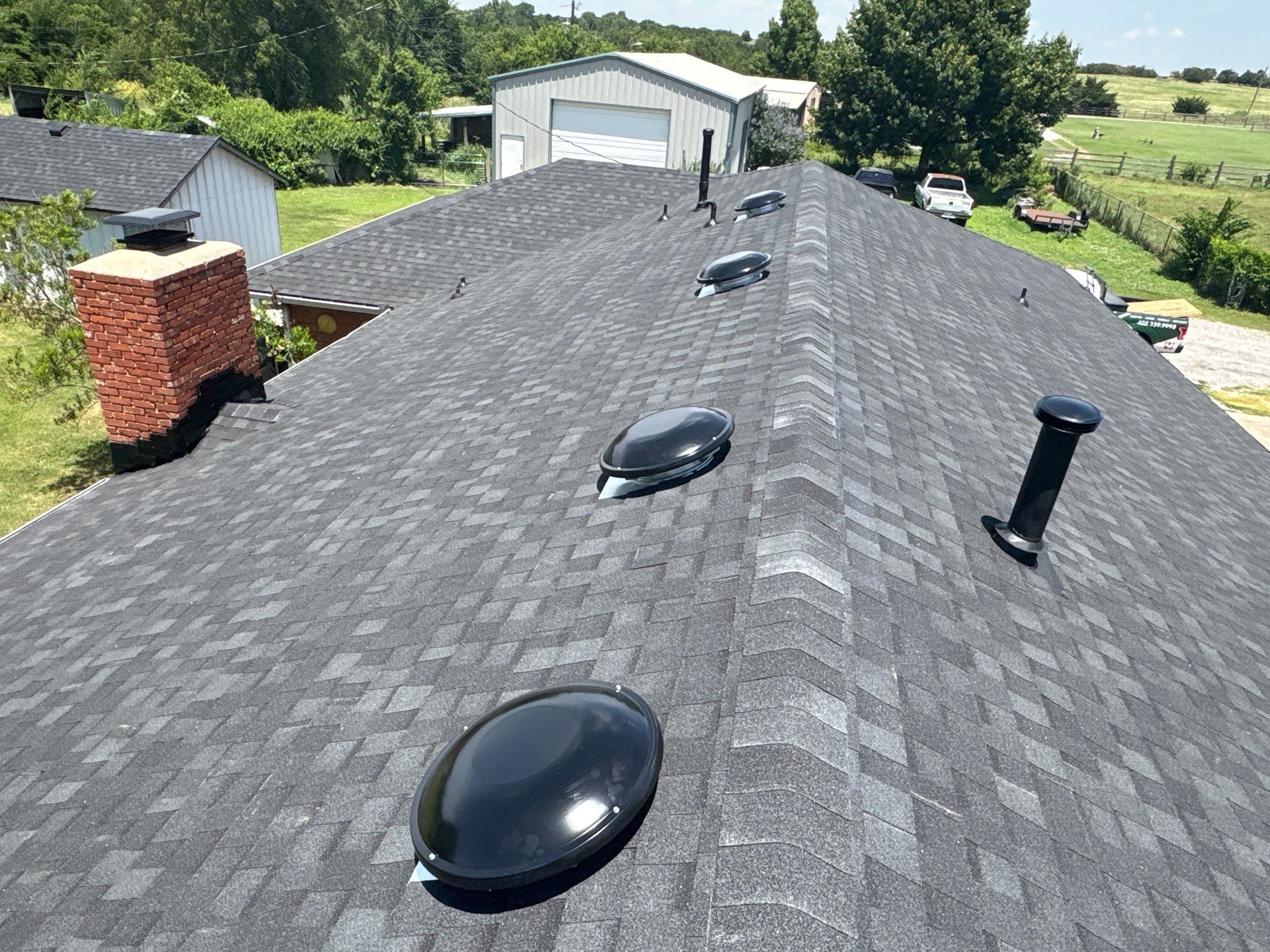 roof and chimney flashing replacement in Mustang by McCann's Roofing and Construction