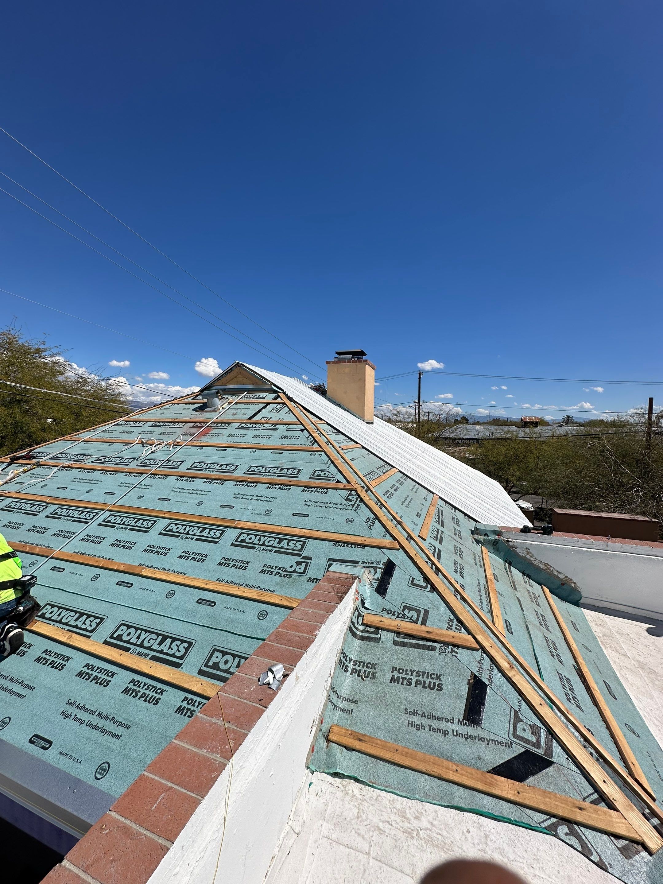 Metallic Silver Exposed Fastener by Reimagine Roofing