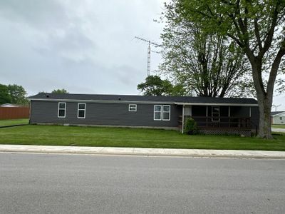 Roof and Siding Replacement using Norandex Cedar Knoll Graphite Siding and Owens Corning Durations in Onyx Black