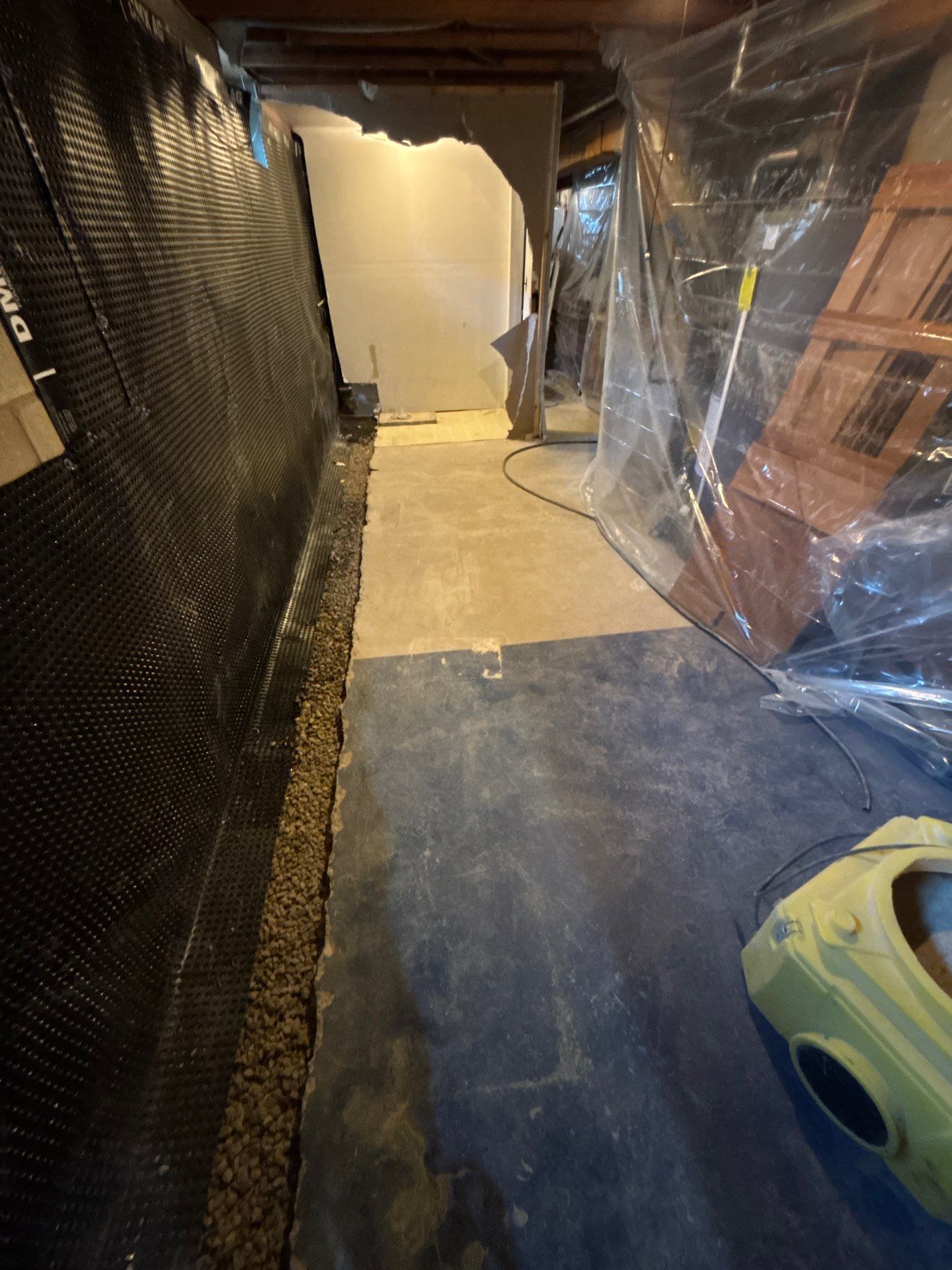 Interior Drain Tile & Buried Discharge in South Minneapolis by Waterproofing Northeast