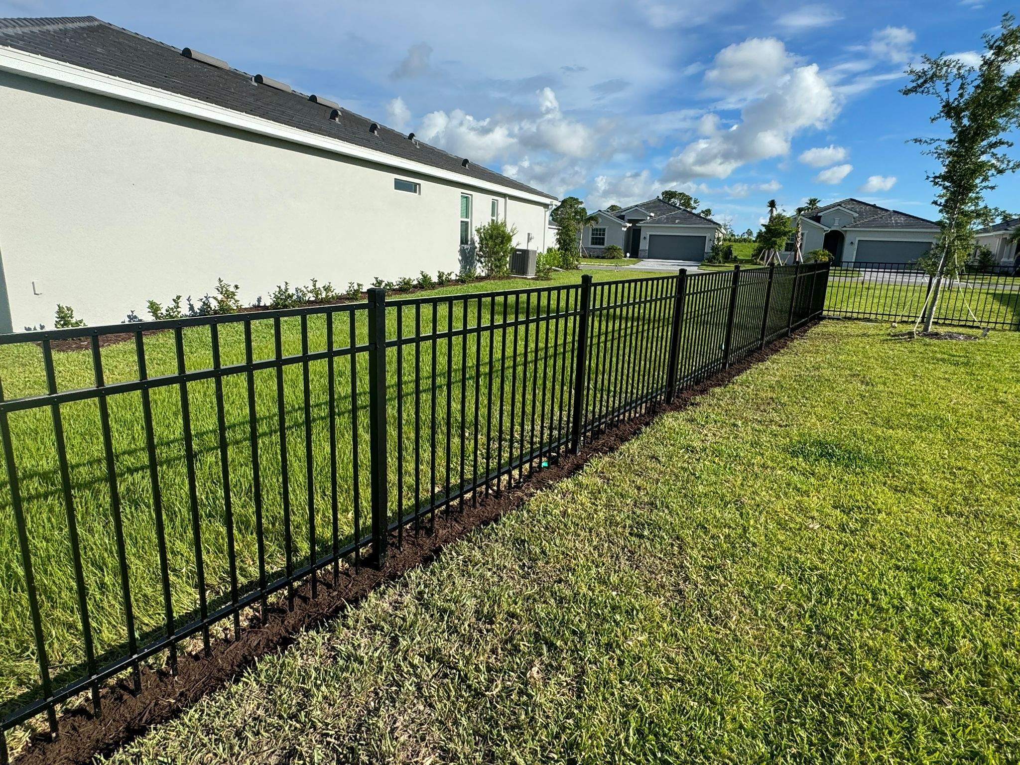 Black Aluminum Picket Fence Installation in Venice, Florida by True Fence LLC