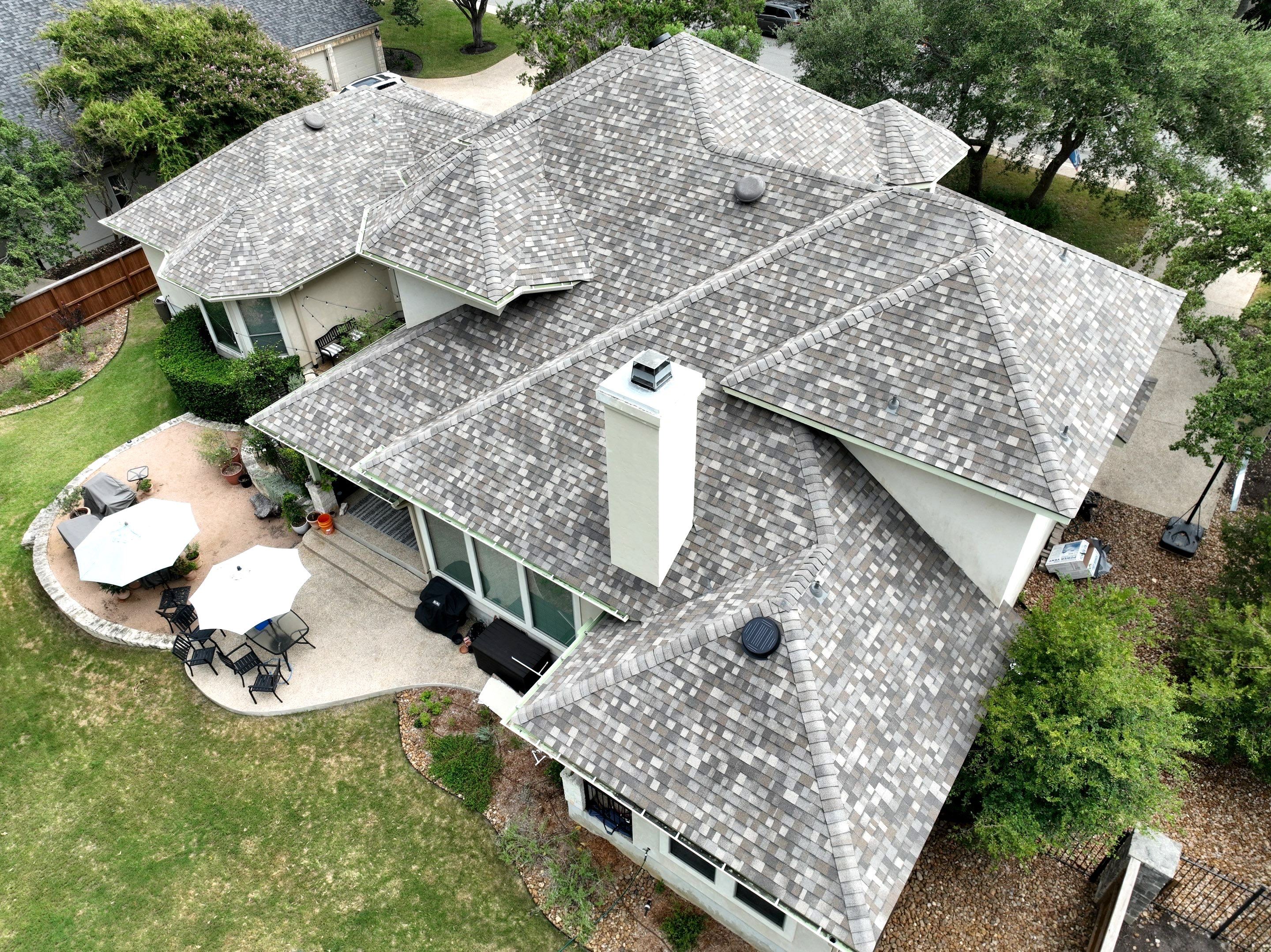 Residential Roof Replacement using 30 Year Laminate Shingles with High Profile Ridge by Premier Roofing and Contracting